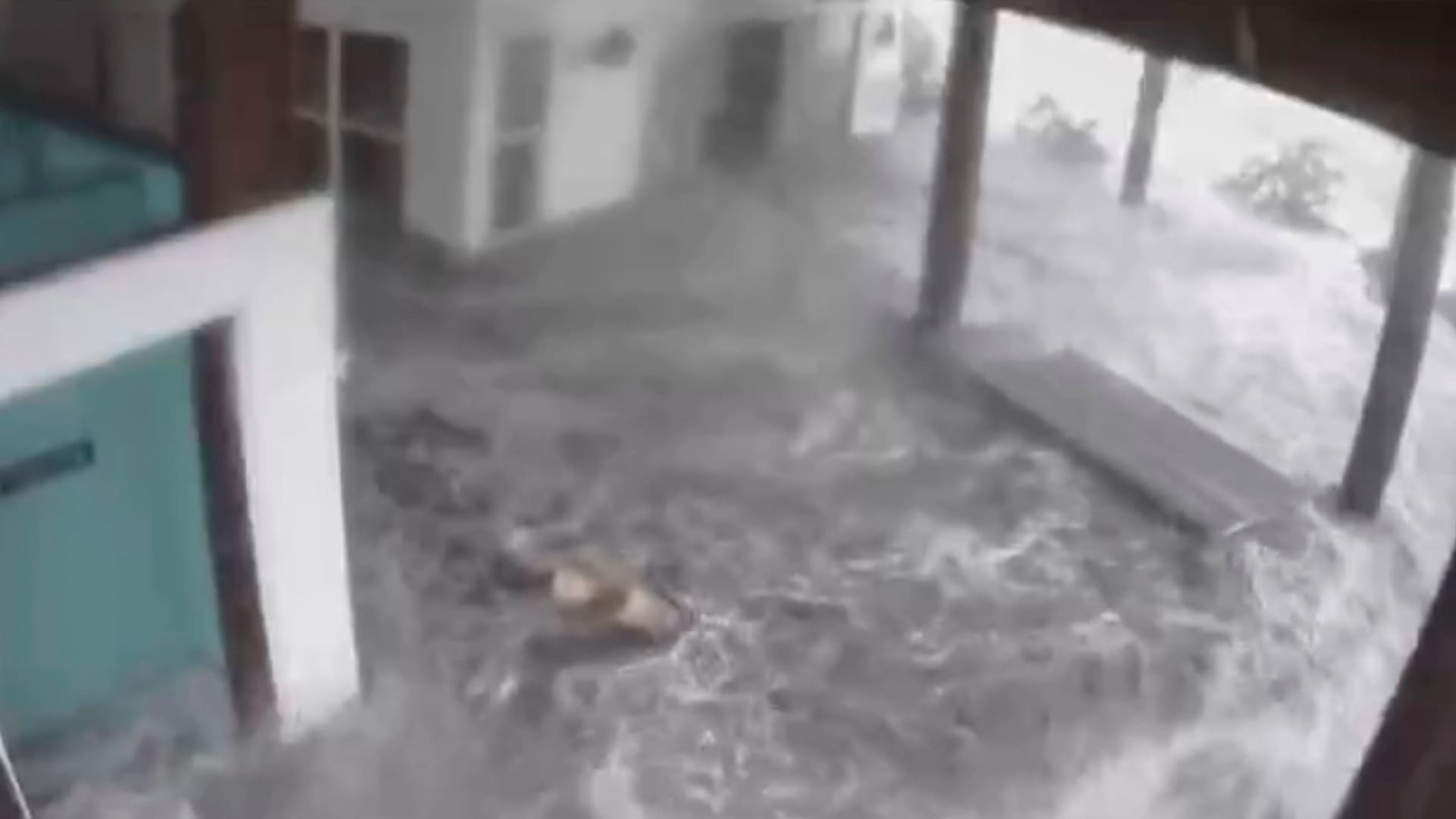 Water enters a beach house as Hurricane Ida makes landfall in Grand Isle, Louisiana, U.S. August 29, 2021 in this still image taken from social media video. Christie Angelette via REUTERS THIS IMAGE HAS BEEN SUPPLIED BY A THIRD PARTY. MANDATORY CREDIT