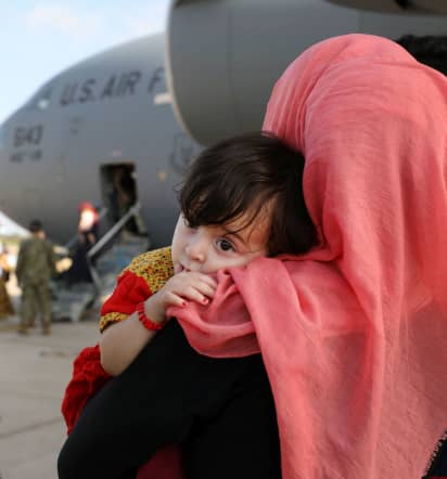 Photos: Evacuees from Afghanistan arrive safely as U.S. winds down its withdrawal
