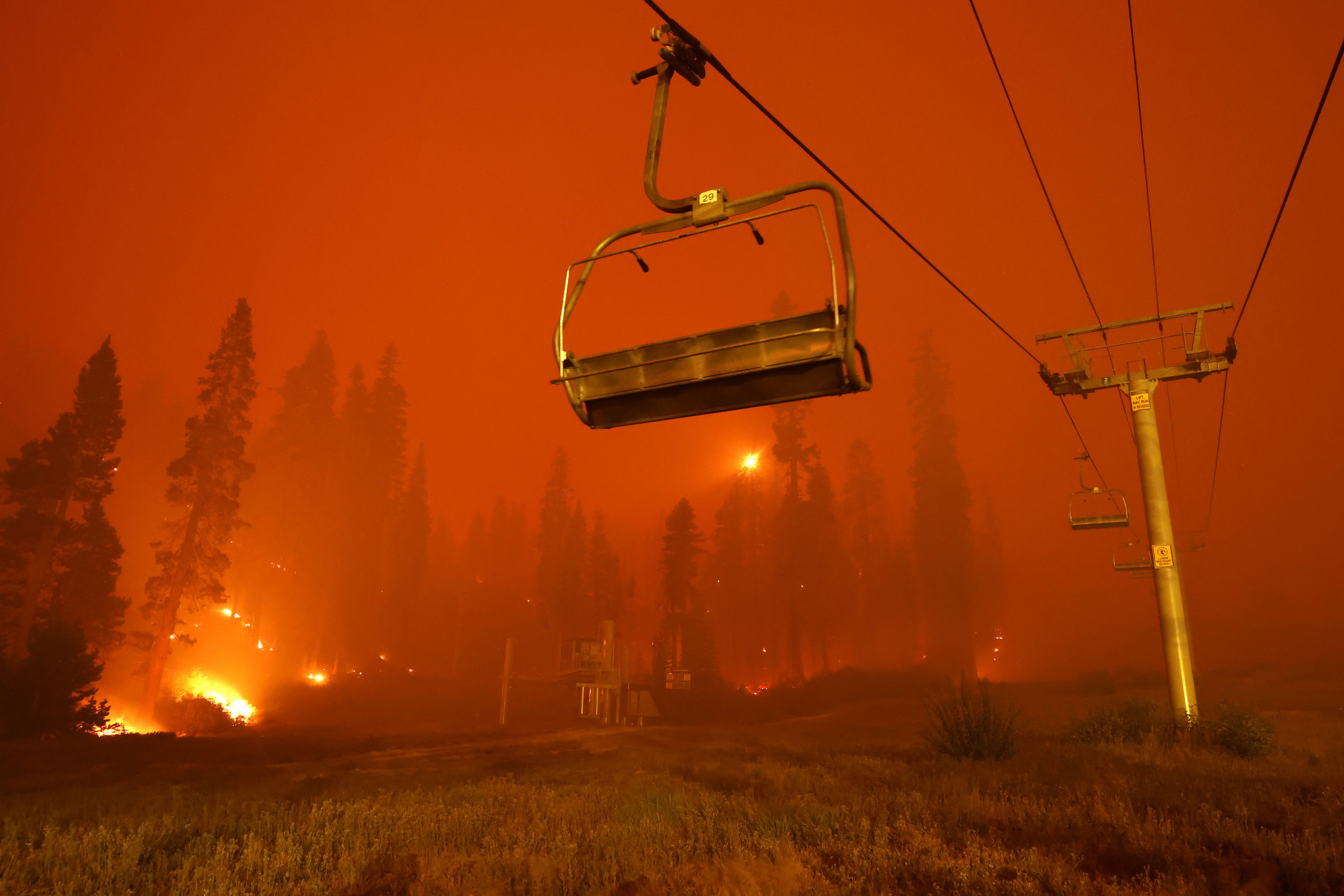 Wildfire forces thousands from popular Lake Tahoe resort city - CNBC