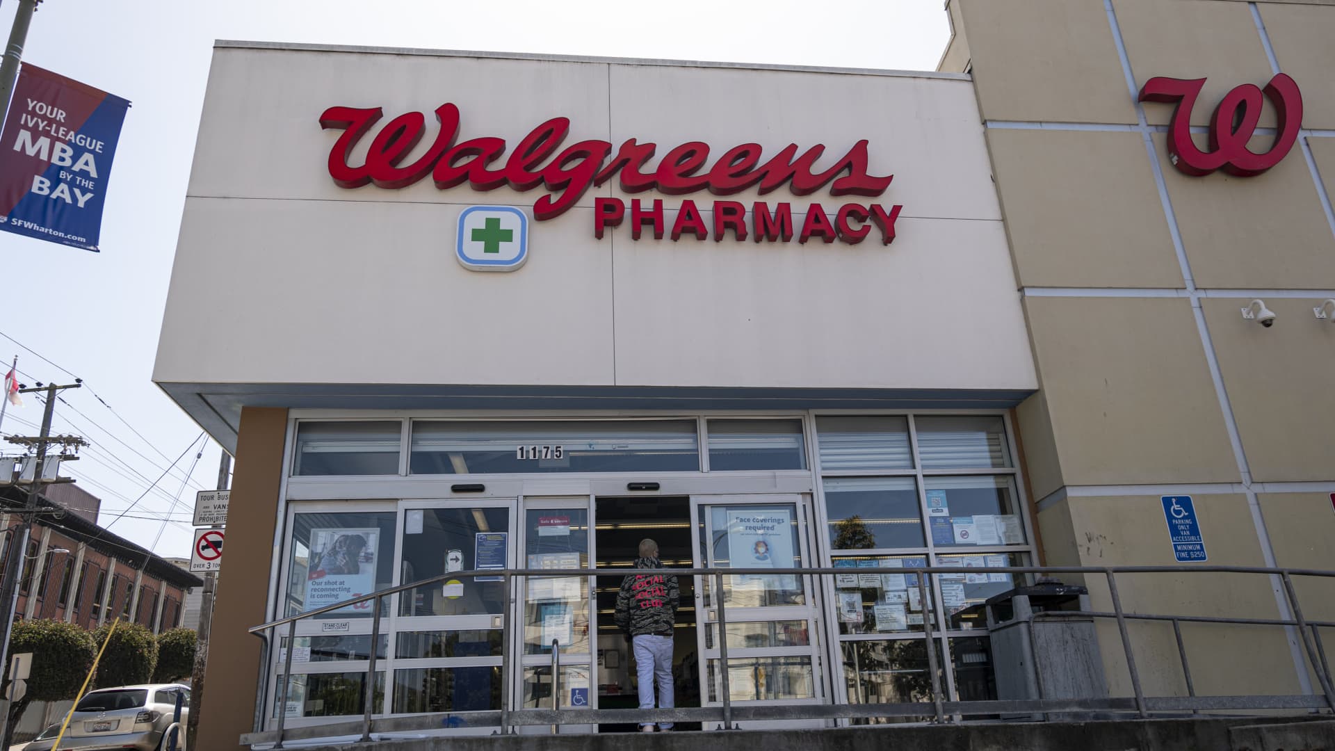 A person enters a Walgreens store in San Francisco, California, U.S., on Tuesday, April 13, 2021.