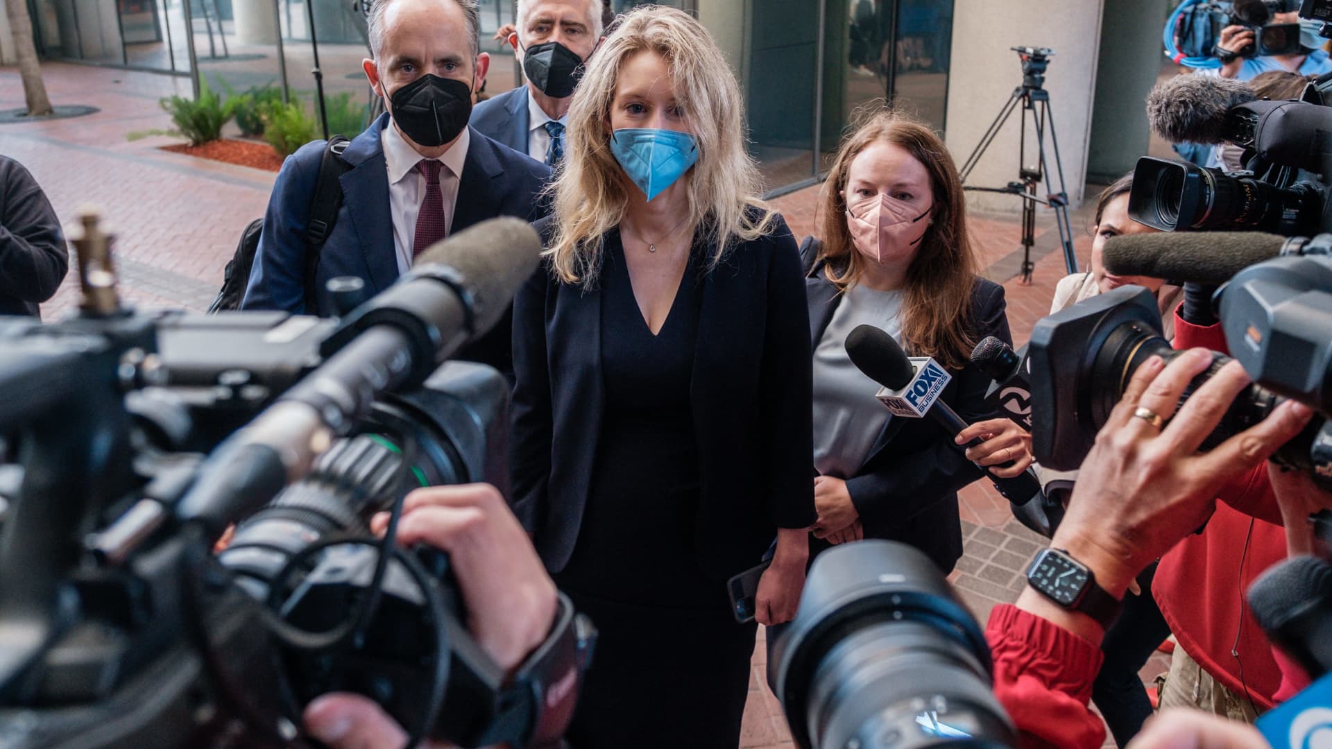 Elizabeth Holmes, the founder and former CEO of blood testing and life sciences company Theranos, arrives for the first day of jury selection in her fraud trial, outside Federal Court in San Jose, California on August 31, 2021.