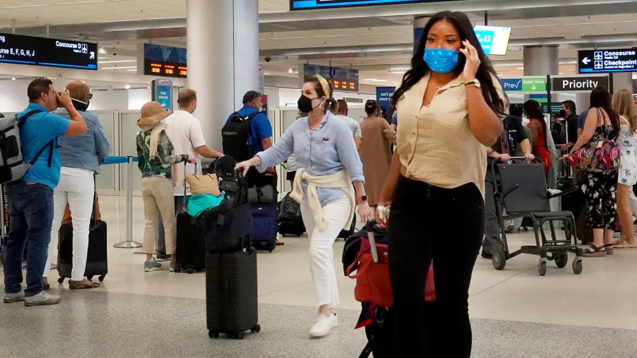 Travelers make their way through the Miami International Airport before starting the Labor Day weekend on September 03, 2021 in Miami, Florida.