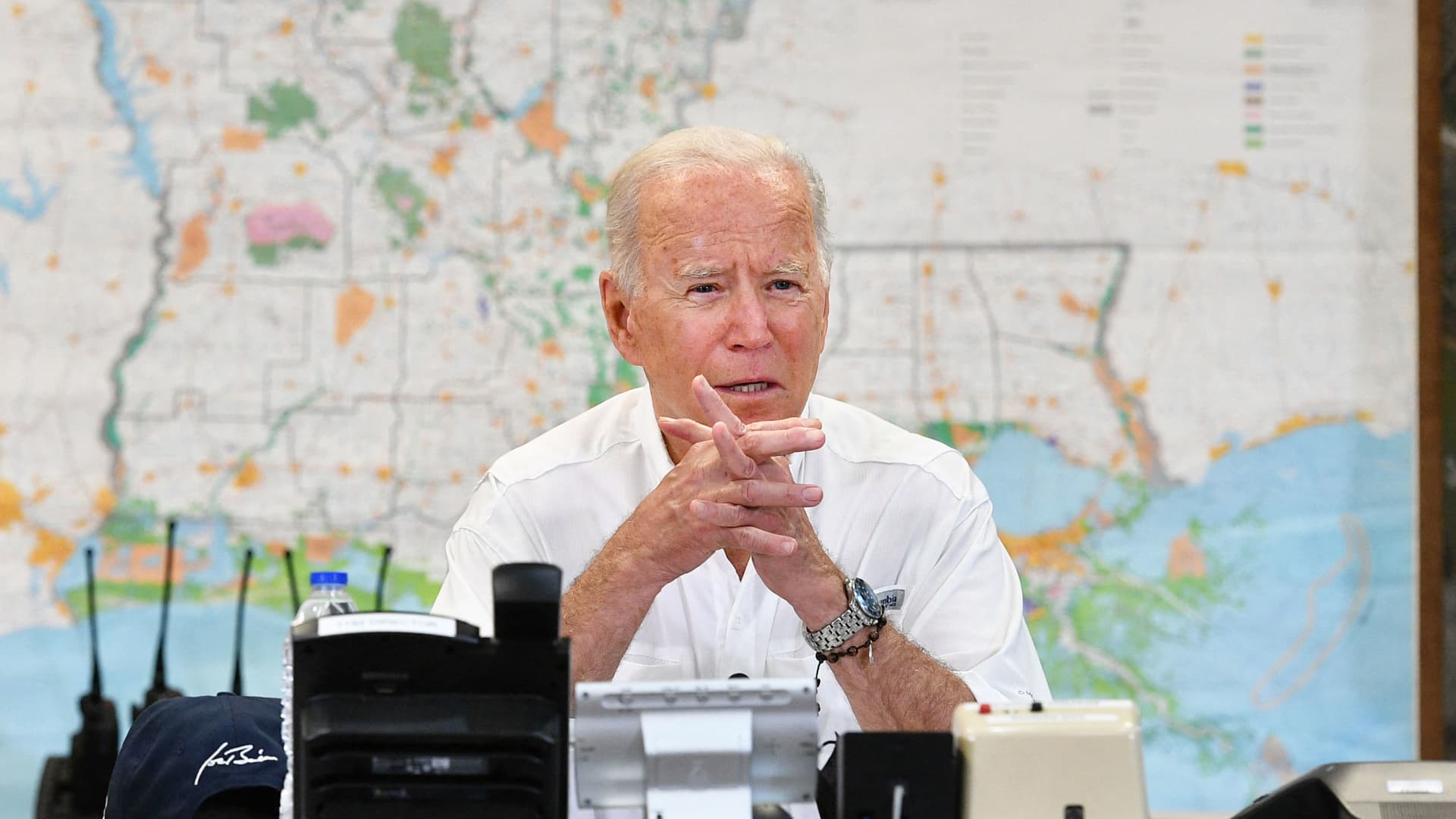 US President Joe Biden takes part in a briefing with local leaders on the impact of Hurricane Ida at the St. John Parish's Emergency Operations Center in LaPlace, Louisiana on September 3, 2021.