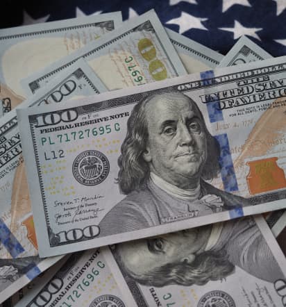 U.S. dollar retreats from five-week high as debt ceiling stalemate weighs 