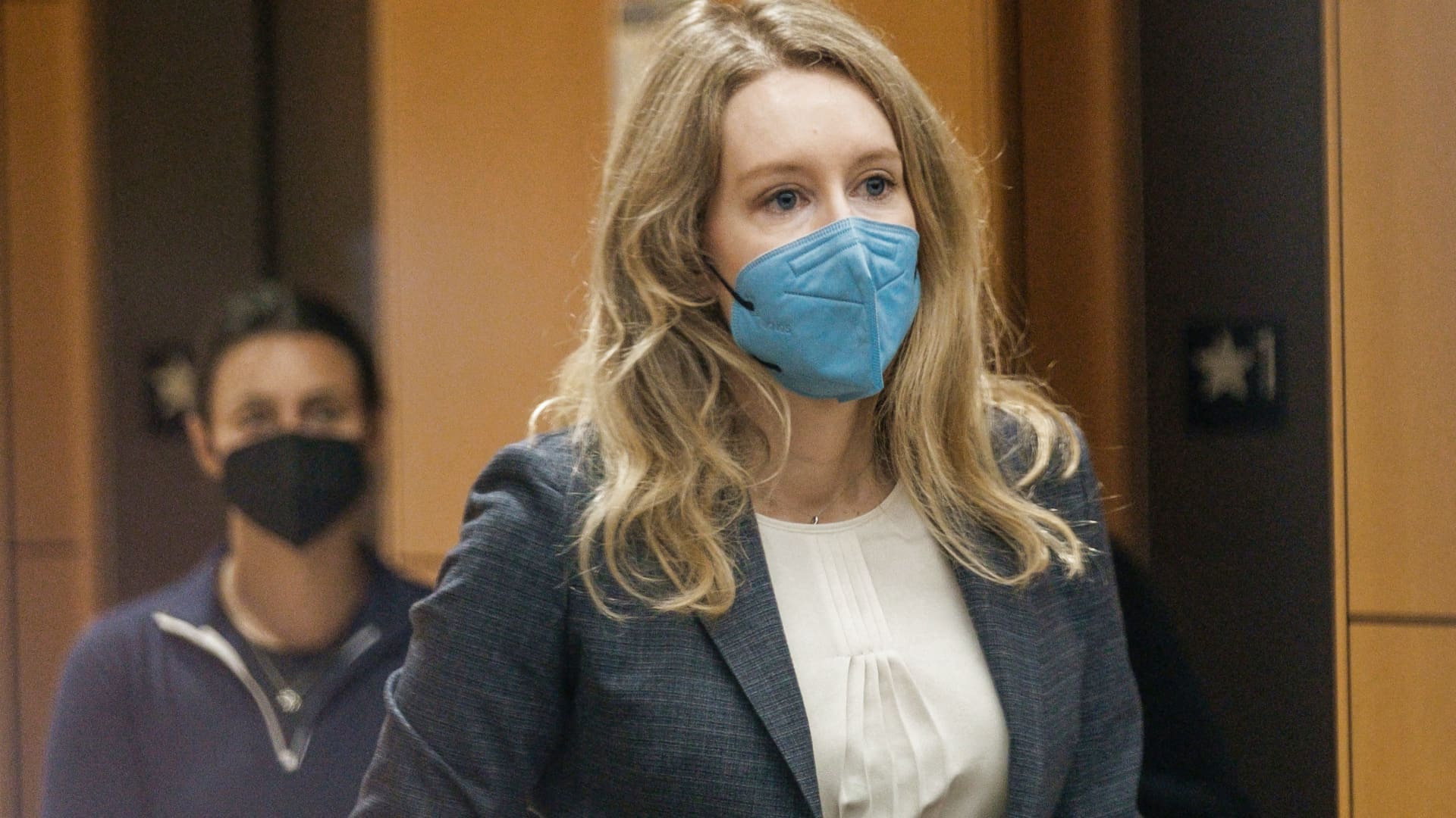 Elizabeth Holmes, the founder and former CEO of blood testing and life sciences company Theranos, arrives for the first day of her fraud trial, outside Federal Court in San Jose, California. September 8, 2021.