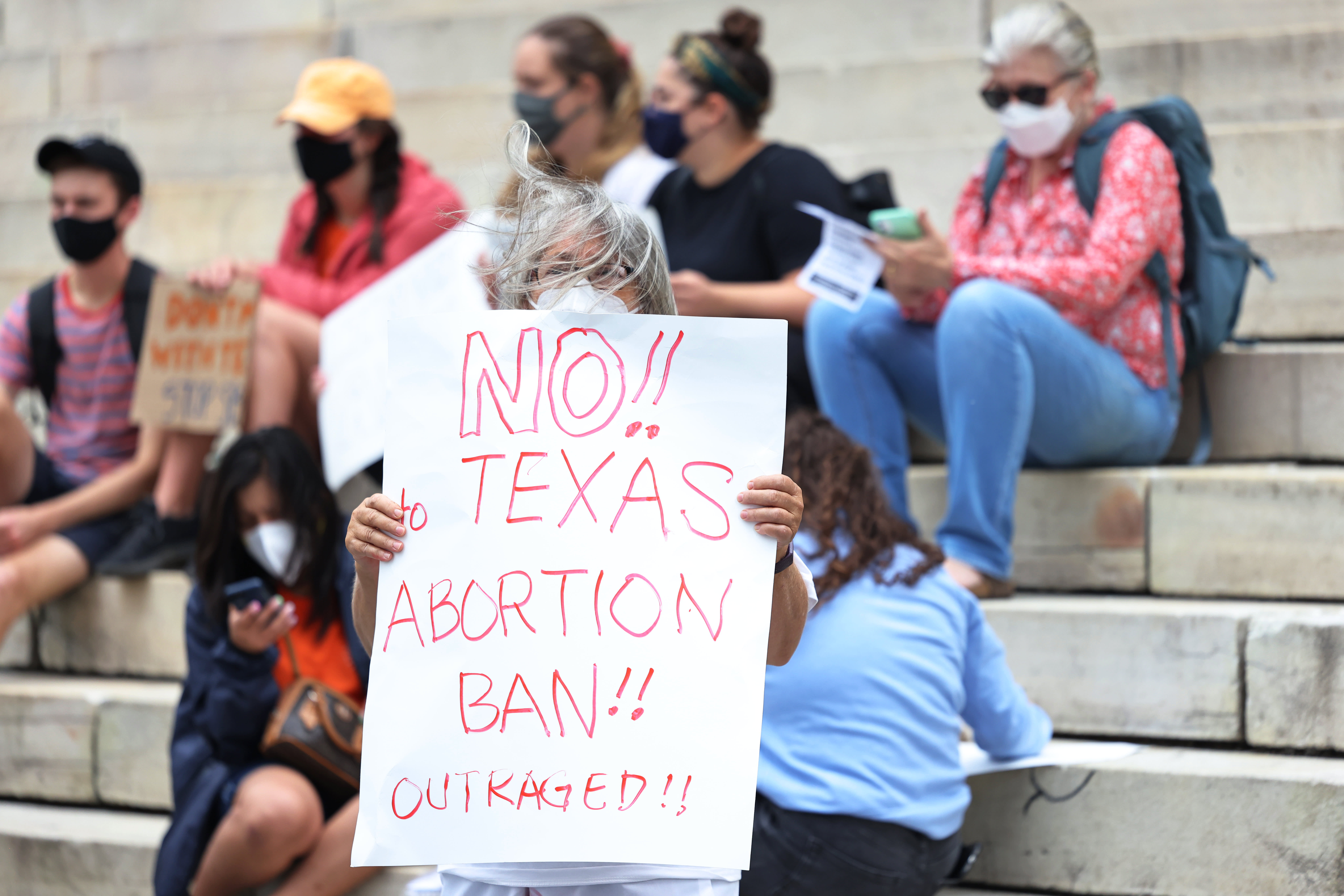 Justice Department to announce lawsuit against Texas over law that bans nearly a..