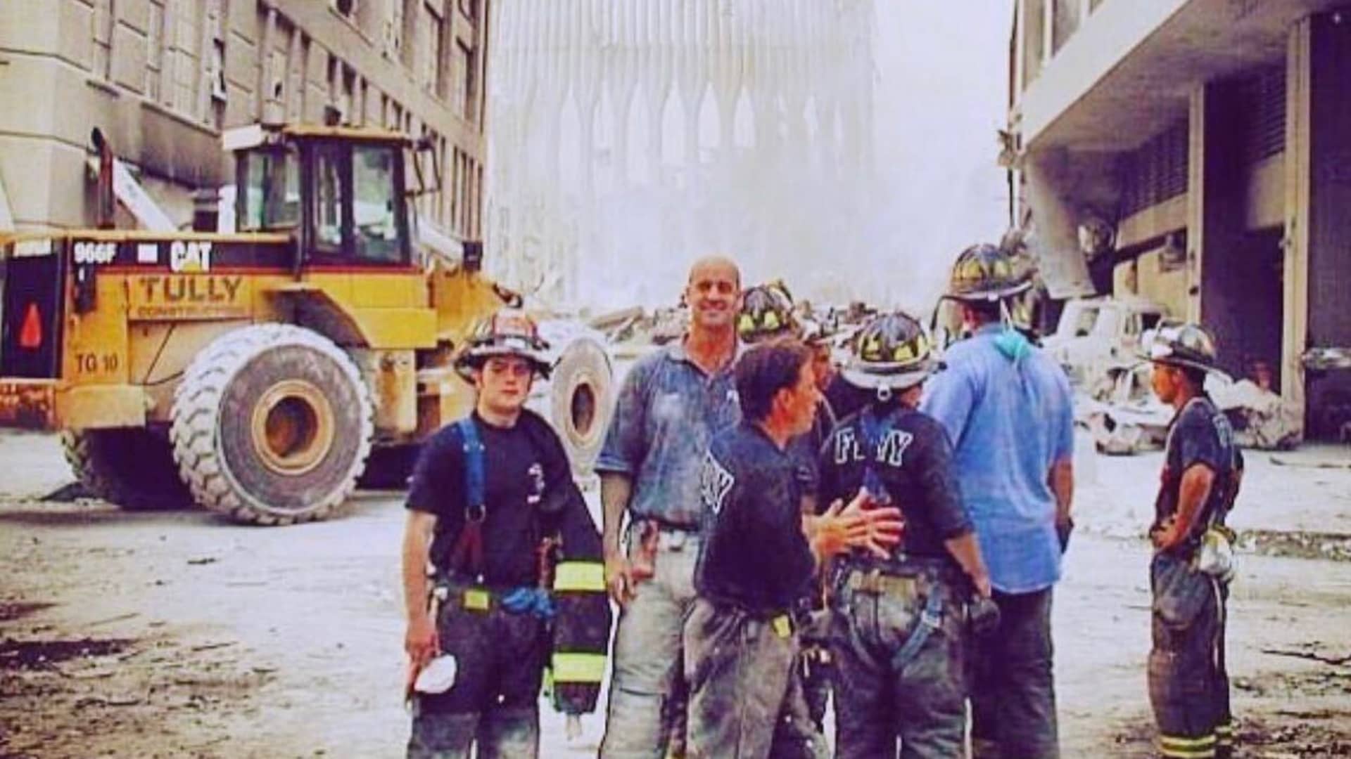 Keith Young (Second from Left) with his fellow firefighters clearing the wreckage at Ground Zero in lower Manhattan in 2001.