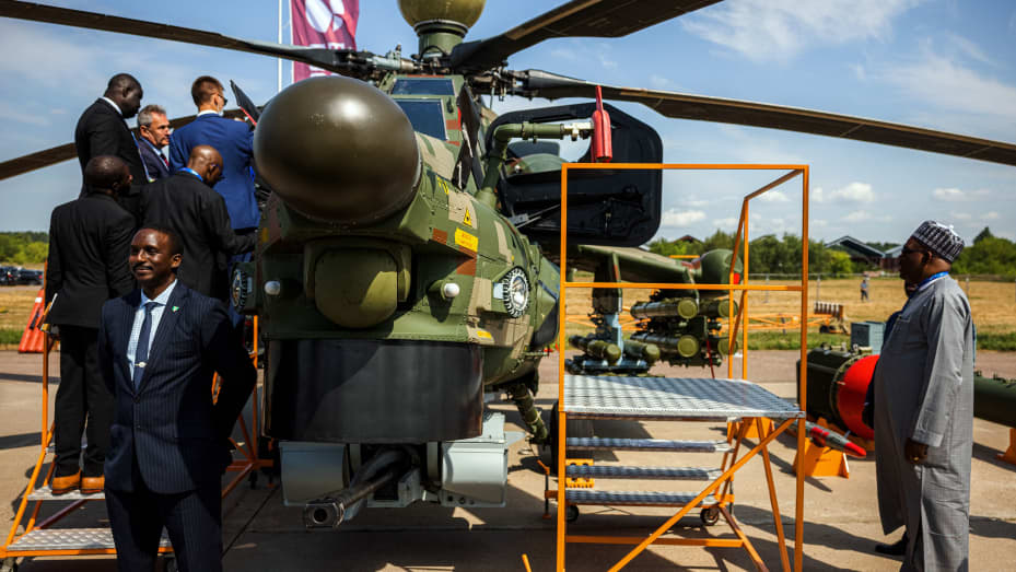 MOSCOW - Members of a Nigerian delegation inspect a Russian Mil Mi-28NE Night Hunter military helicopter during the opening day of the MAKS-2021 International Aviation and Space Salon at Zhukovsky outside Moscow on July 20, 2021.