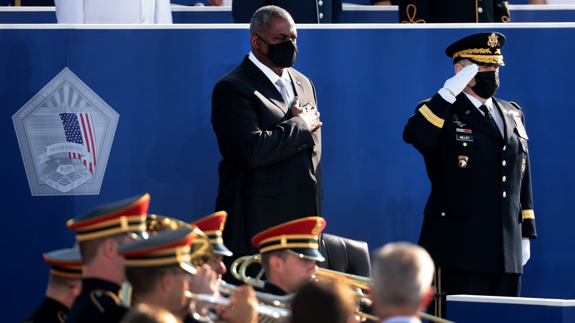 Secretary of Defense Lloyd Austin (L) and Chairman of the Joint Chiefs of Staff Gen. Mark A. Milley stand for the national anthem during the Pentagon 9/11 observance ceremony at the National 9/11 Pentagon Memorial on September 11, 2021 in Arlington, Virginia.