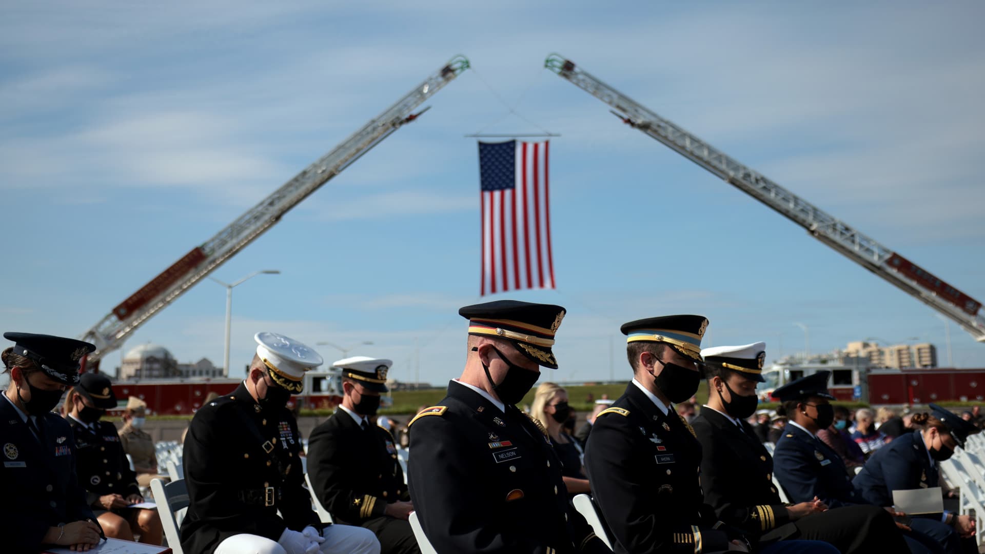 U.S. service members attend the Pentagon 9/11 observance ceremony at the National 9/11 Pentagon Memorial on September 11, 2021 in Arlington, Virginia.