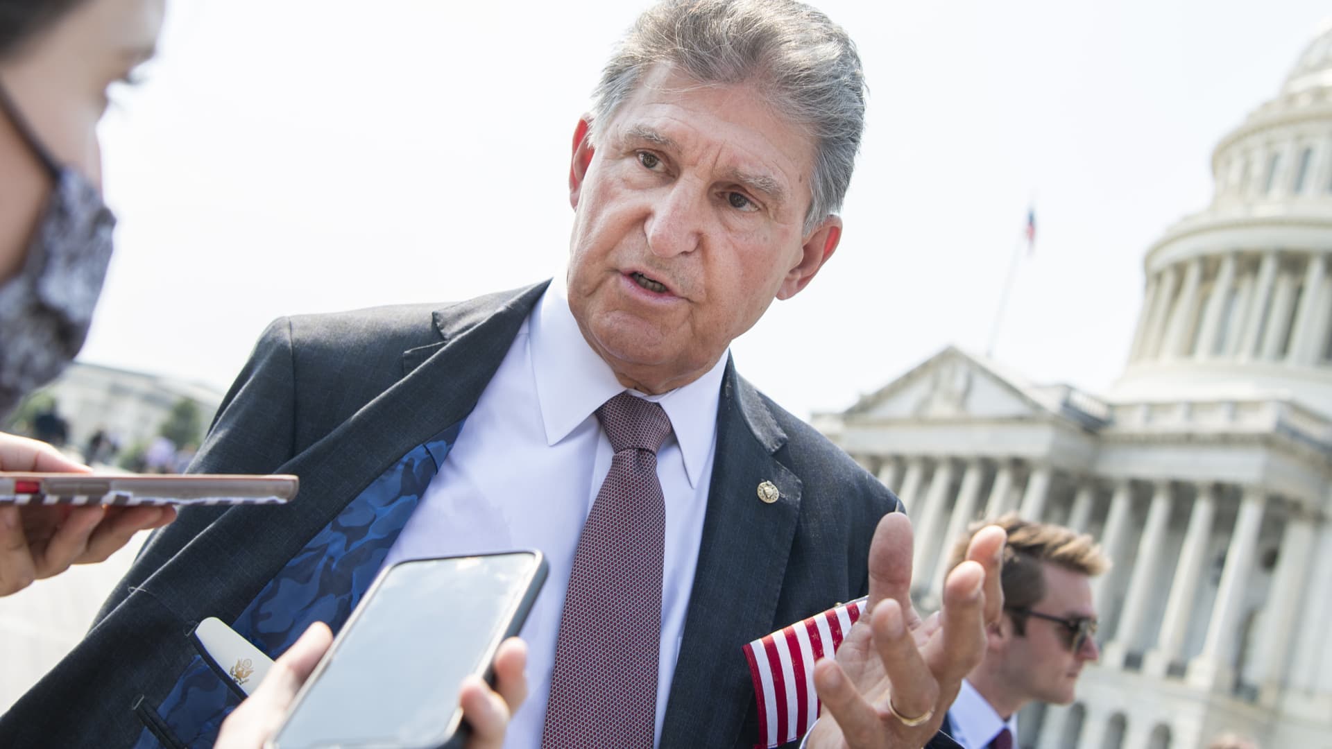 Sen. Joe Manchin, D-W.Va., talks with reporters after a remembrance ceremony on the east front steps of the U.S. Capitol for the 20th anniversary of the 9/11 terrorist attacks on Monday, September 13, 2021.