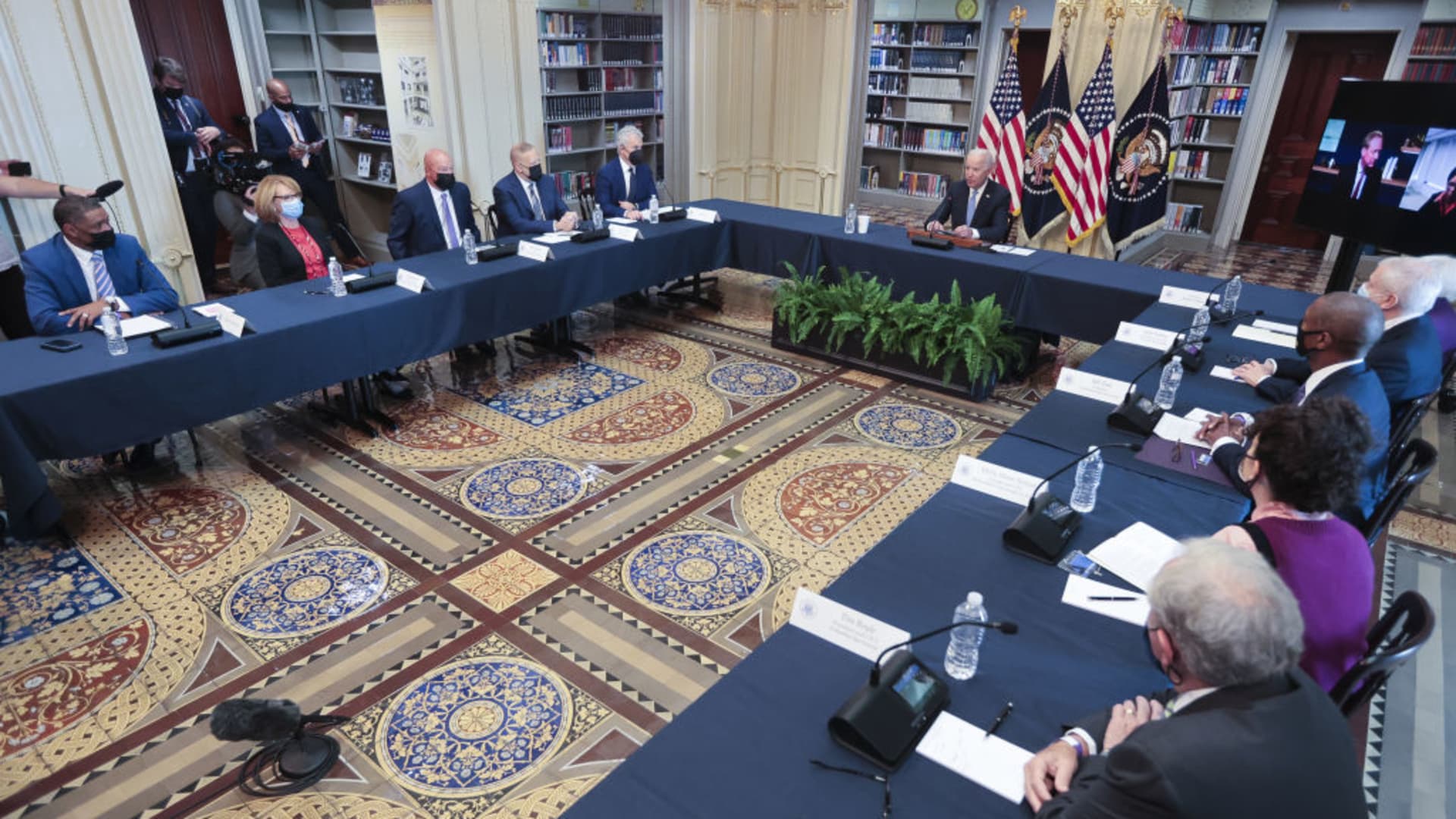 U.S. President Joe Biden, center, speaks during a meeting in the Eisenhower Executive Office Building Library in Washington, D.C., U.S., on Wednesday, Sept. 15, 2021.