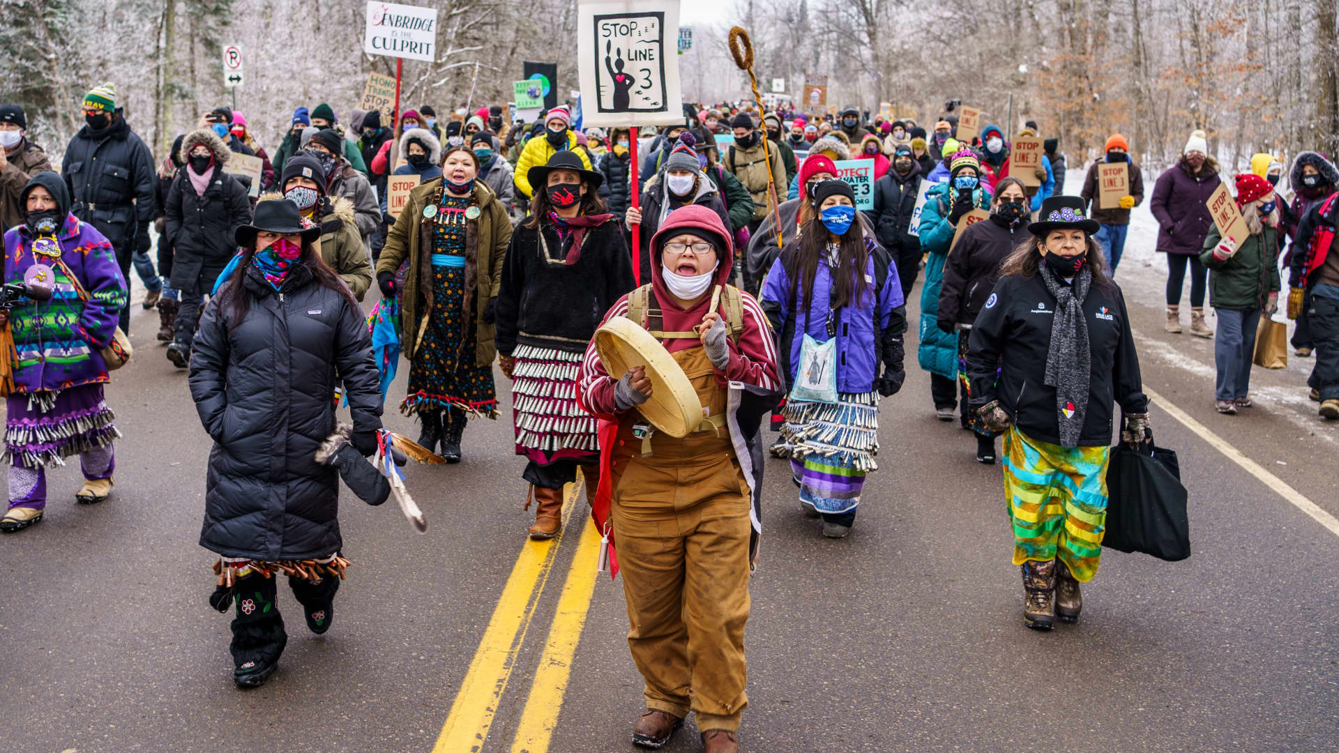 Environmental activists and Native Americans march to the construction site for the Line 3 oil pipeline near Palisade, Minnesota on January 9, 2021. Line 3 is an oil sands pipeline which runs from Hardisty, Alberta, Canada to Superior, Wisconsin in the United States.