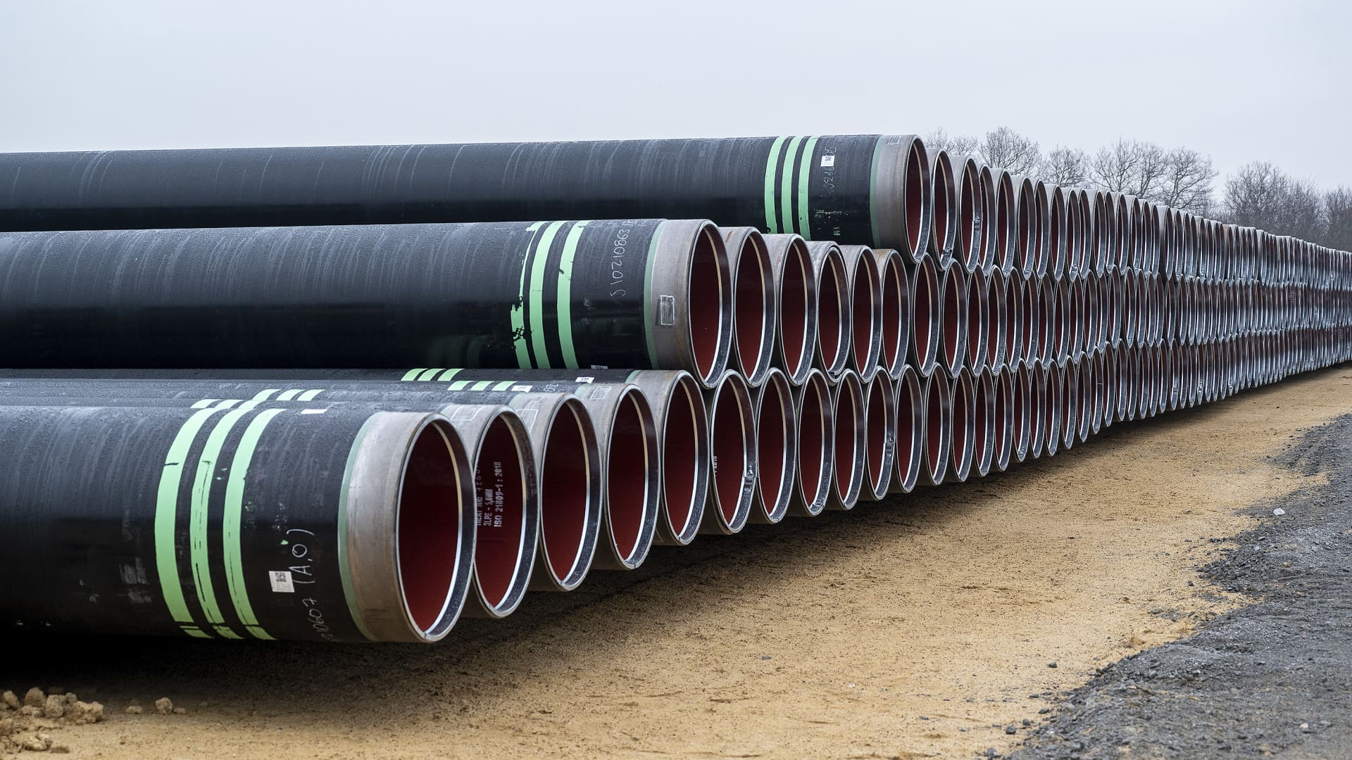 Pipes for the Baltic Pipe gas pipeline are stacked at Houstrup Strand, near Noerre Nebel, Jutland, Denmark, on February 23, 2021. The Baltic Pipe gas pipeline, which is to come ashore at Esbjerg, on the west coast of the Jutland peninsula, will transport ten billion cubic meters of gas every year from the Norwegian gas fields in the North Sea through Denmark and to Poland.