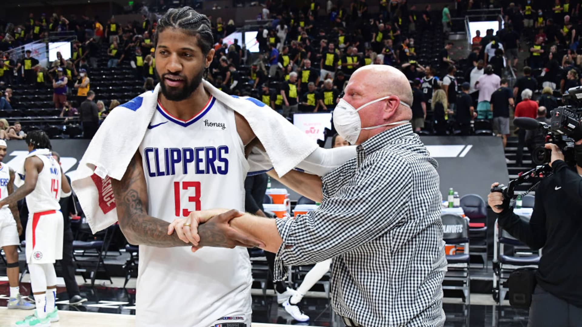 Paul George #13 of the LA Clippers talks to Owner, Steve Ballmer of the LA Clippers after the game against the Utah Jazz during Round 2, Game 5 of the 2021 NBA Playoffs on June 16, 2021 at vivint.SmartHome Arena in Salt Lake City, Utah.