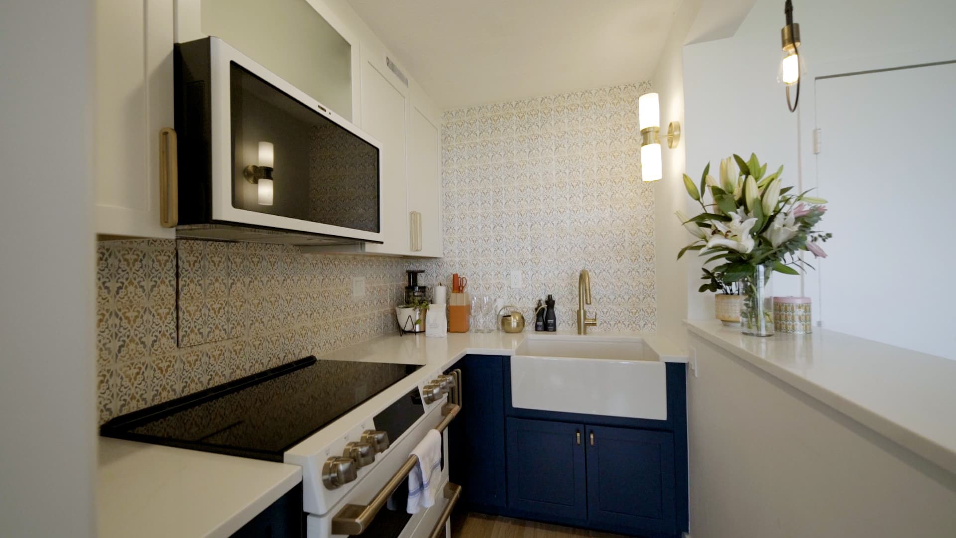 The tiles on the kitchen backsplash are a splurge that Nabongo purchased from Spain.