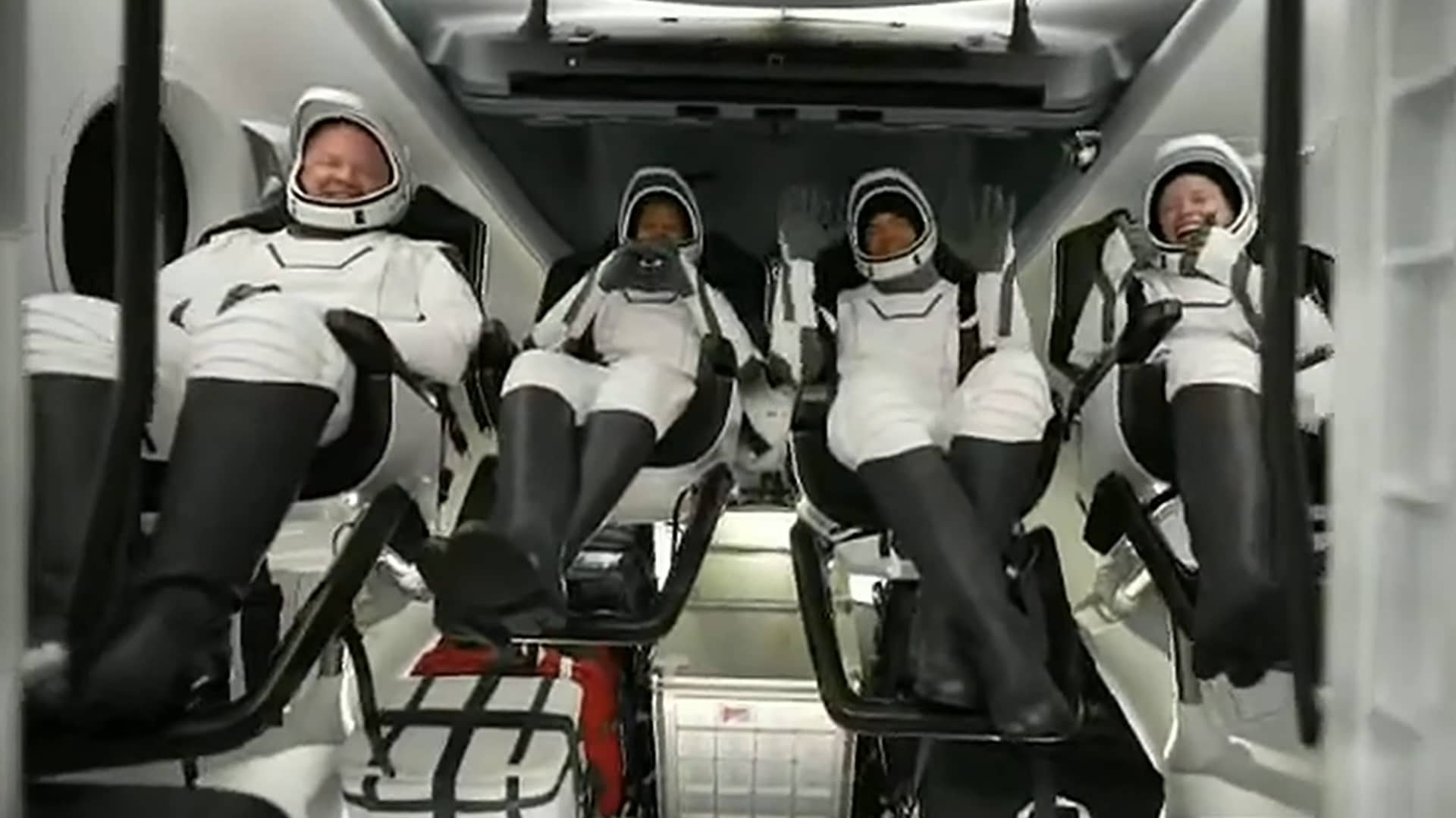 The Inspiration4 crew inside Crew Dragon capsule Resilience after the hatch was reopened. From left: Mission specialist Chris Sembroski, pilot Sian Proctor, commander Jared Isaacman, and medical officer Hayley Arceneaux.