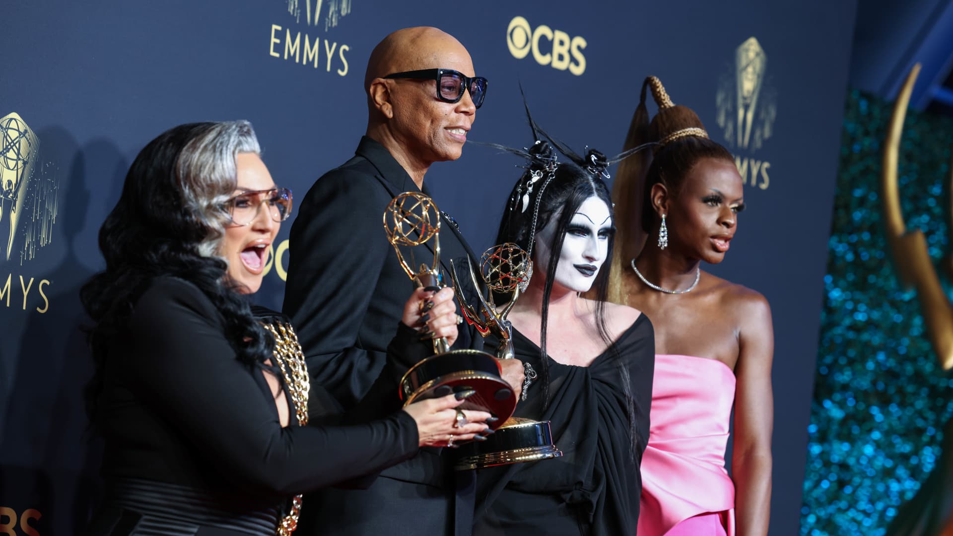 (L-R) Michelle Visage, RuPaul, Gottmik, and Symone, winners of the Outstanding Competition Program award for 'RuPaul's Drag Race,' pose in the press room during the 73rd Primetime Emmy Awards at L.A. LIVE on September 19, 2021 in Los Angeles, California.