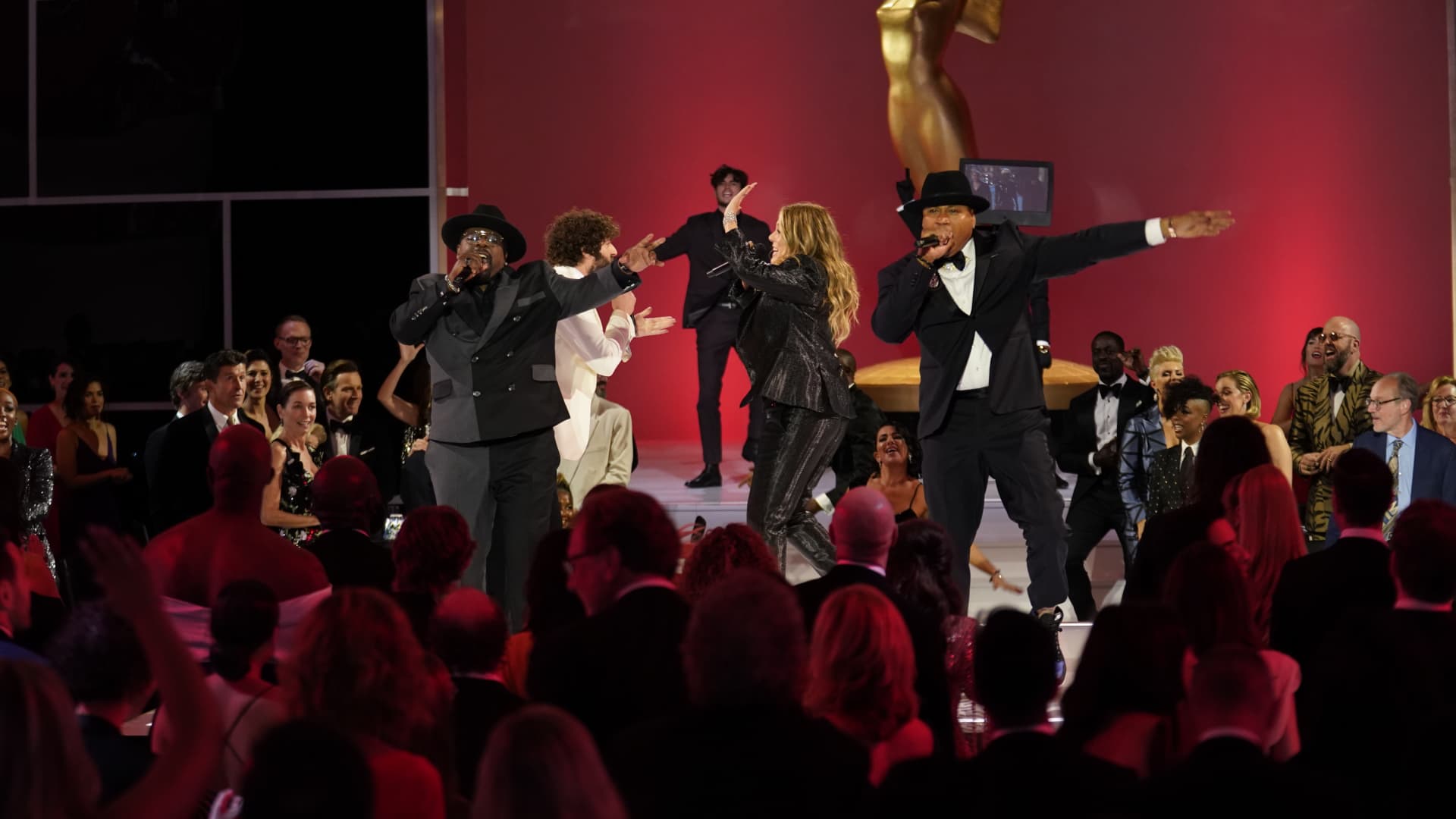 Cedric The Entertainer, Rita Wilson, and LL Cool J appear at the 73rd Emmy Awards.