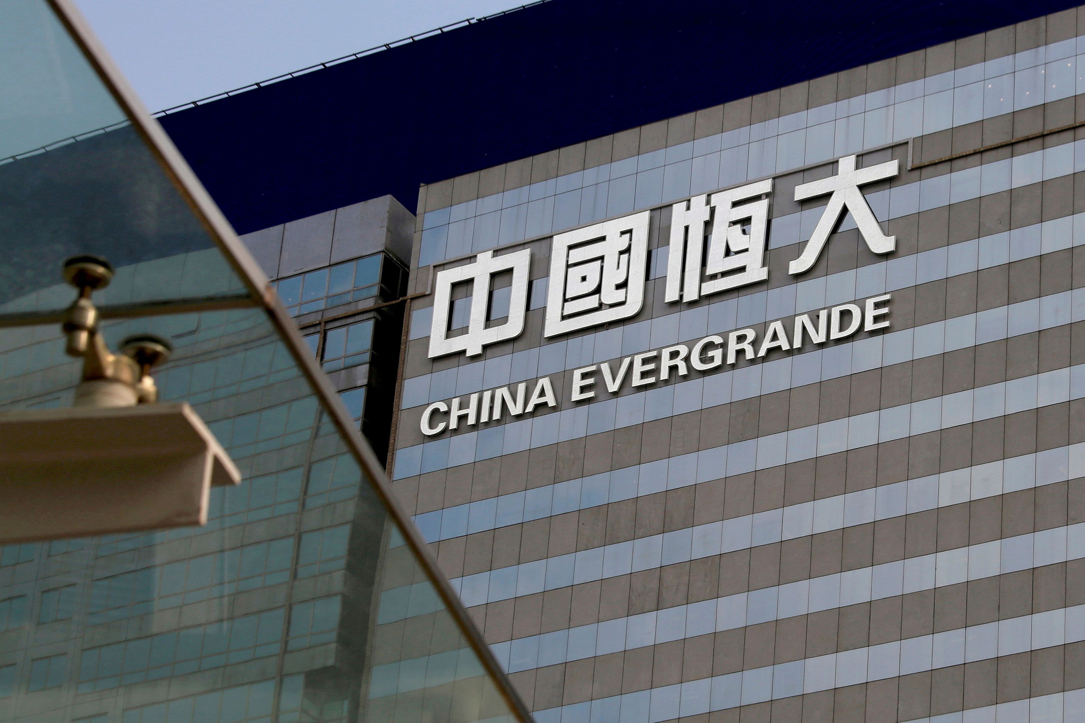 China asks local officials to prepare for 'possible storm' if Evergrande fails, ..