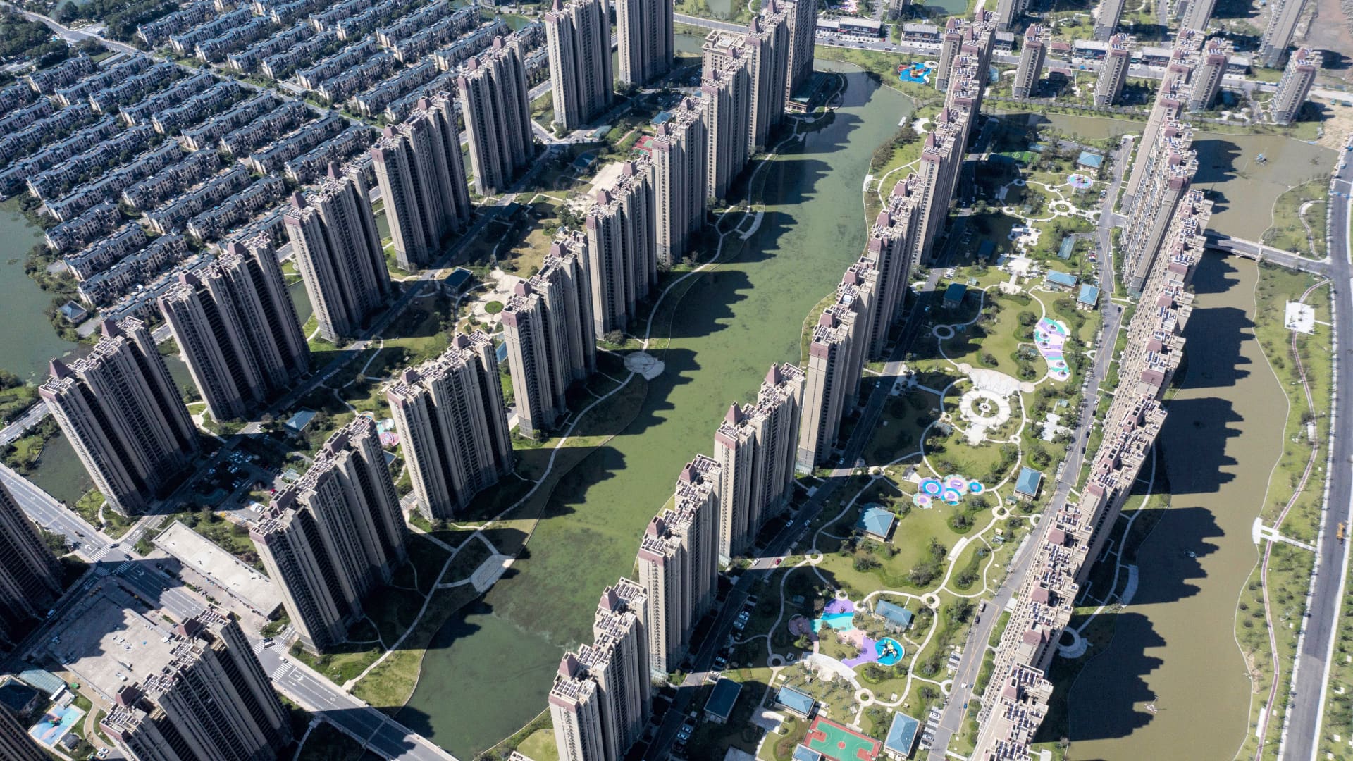 Apartment buildings and recreational facilities at China Evergrande Group's Life in Venice real estate and tourism development in Qidong, Jiangsu province, China, on Tuesday, Sept. 21, 2021.