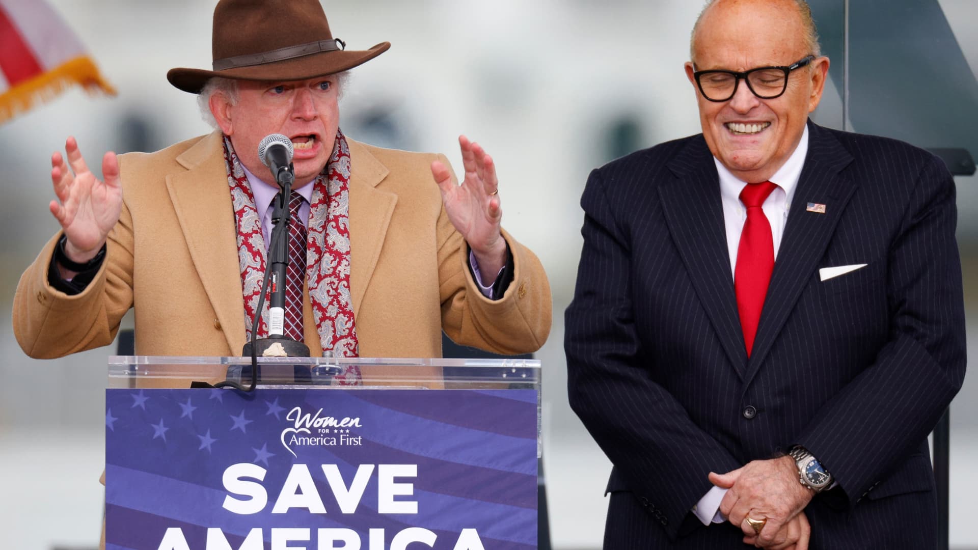 Attorney John Eastman gestures as he speaks next to U.S. President Donald Trump's personal attorney Rudy Giuliani, as Trump supporters gather ahead of the president’s speech to contest the certification by the U.S. Congress of the results of the 2020 U.S. presidential election on the Ellipse in Washington, January 6, 2021.