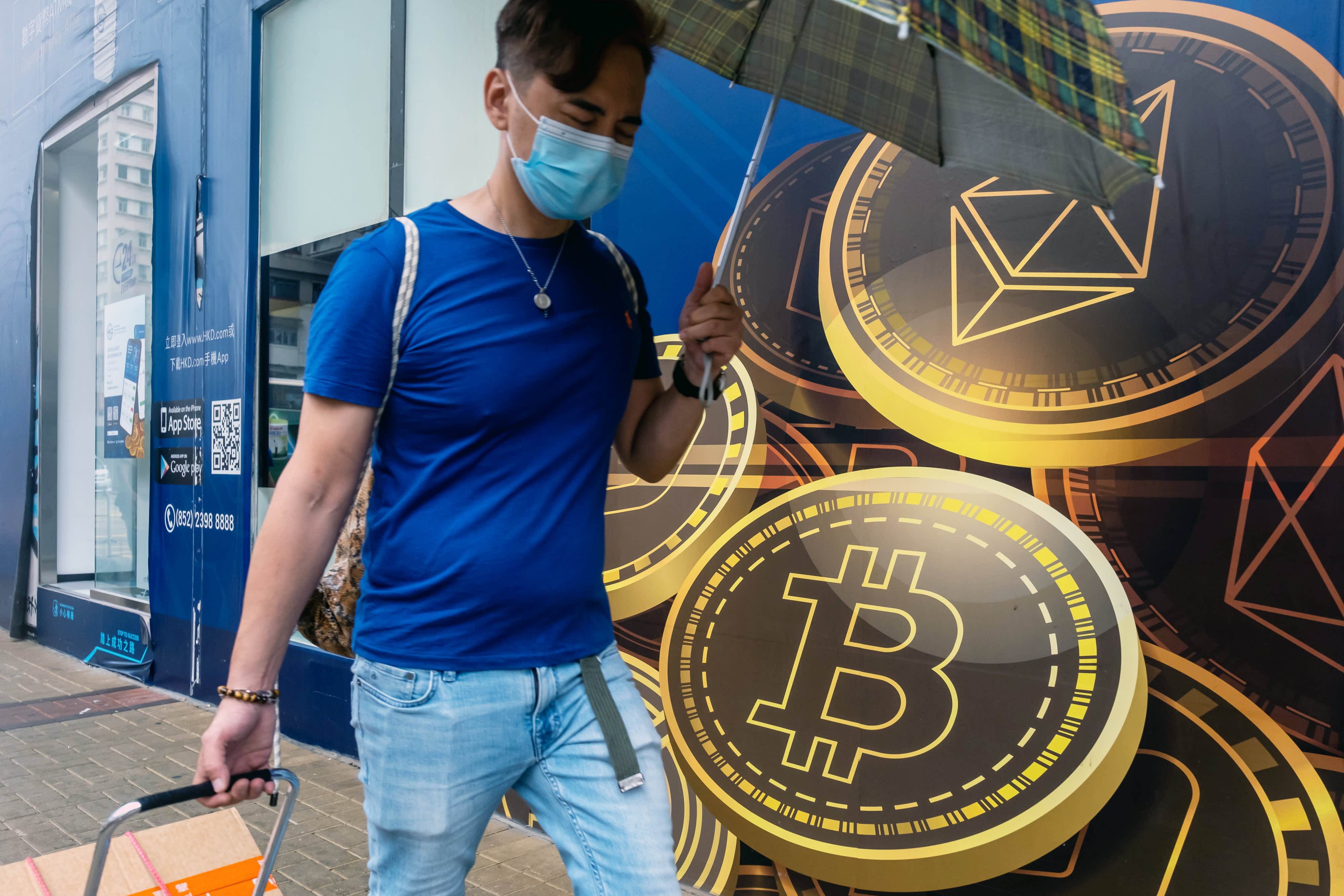 China's central bank renewed its tough talk on bitcoin Friday, calling all digital currency activities illegal and vowing to crack down on the ma