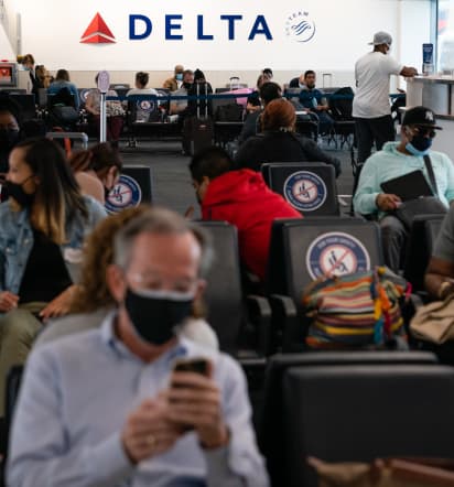 Delta's health chief thinks the airplane mask mandate will soon be lifted