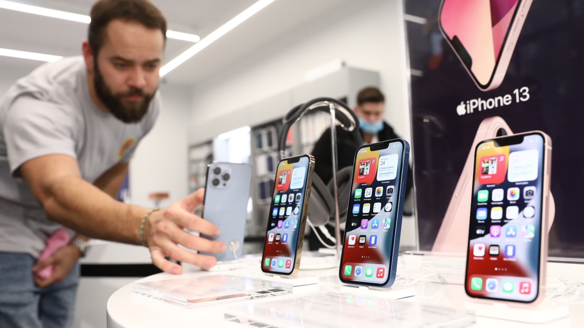 New Apple iPhone 13 smartphones on display in the re:Store shop. The iPhone 13 went on sale on 24 September in Russia.