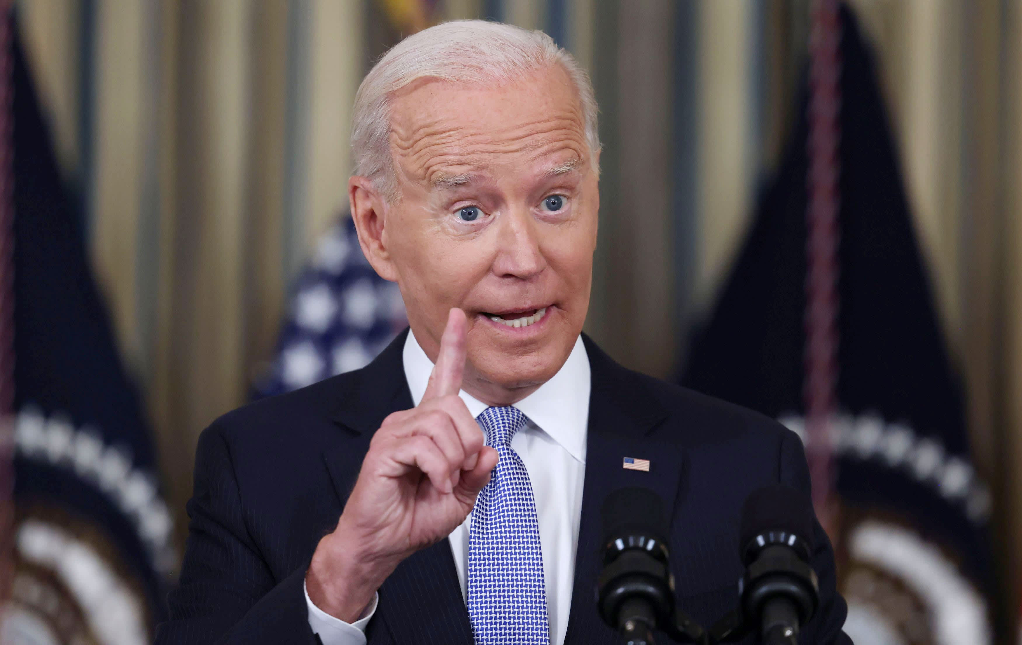 Biden says unvaccinated Americans are 'costing all of us' as he presses Covid vaccine mandates