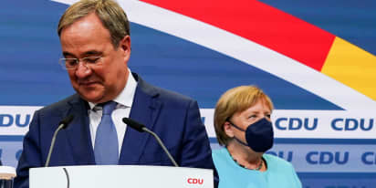 Pressure mounts on Merkel's bloc after worst-ever election result