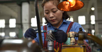 China's manufacturing unexpectedly shrinks in September, services offer support