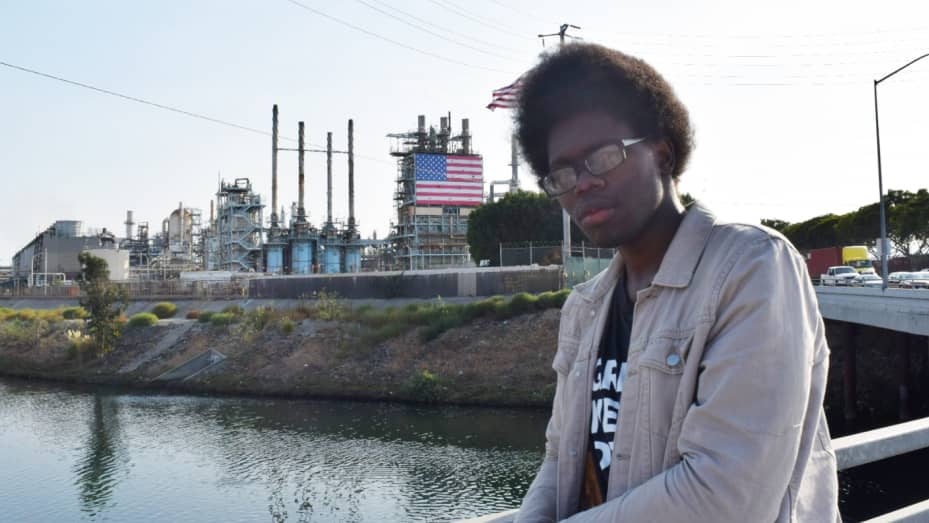 Josiah Edwards, 21, grew up near the largest oil refinery on the West Coast. "Oil drilling and refineries were always an ever-present background in my life," he said.
