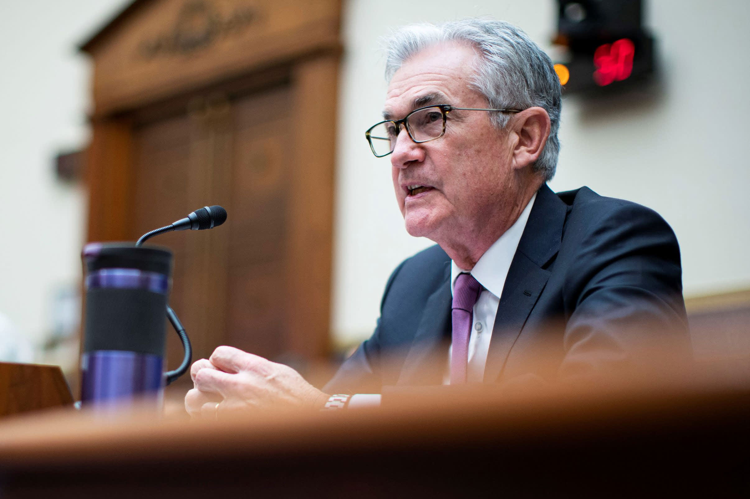 Fed is expected to speed up end of bond buying, signal rate hikes are coming