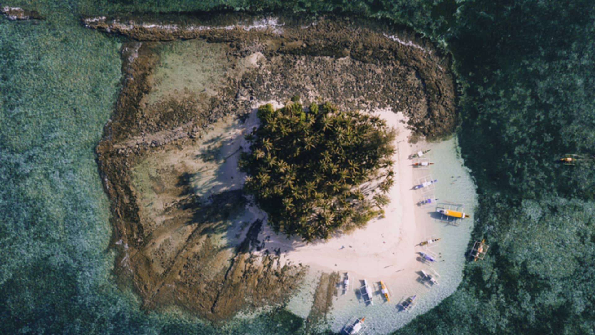 Guyam Island is a small island near Siargao that is popular among island hopping tourists.