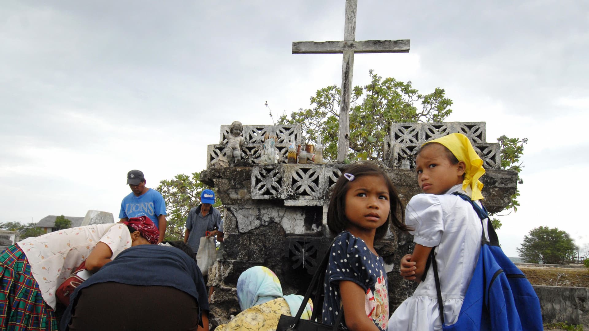 Villagers in Siquijor gather ashes from a cemetery to use in rituals to protect their homes and livestock.