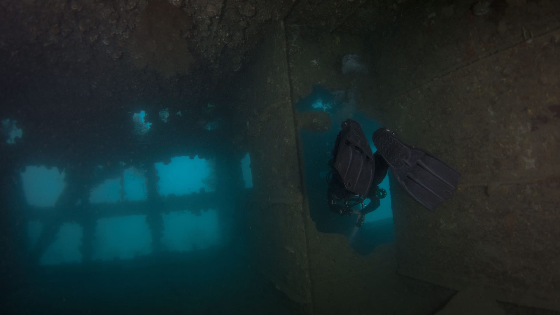 A diver explores World War II Japanese wreckage near Coron, Palawan.