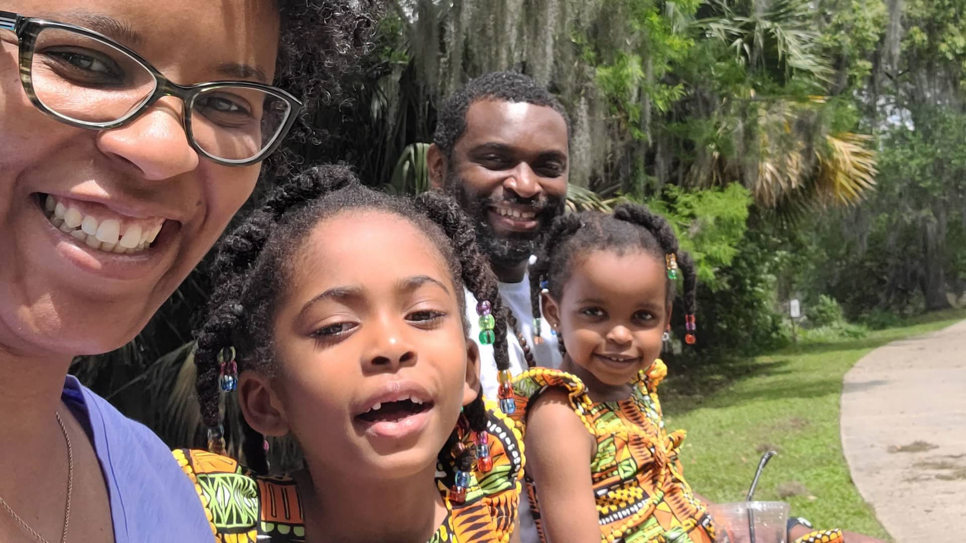 Adrienne Streater, pictured with her husband Douglas and two daughters, says having access to paid family leave would have helped tremendously when she was a new mother.