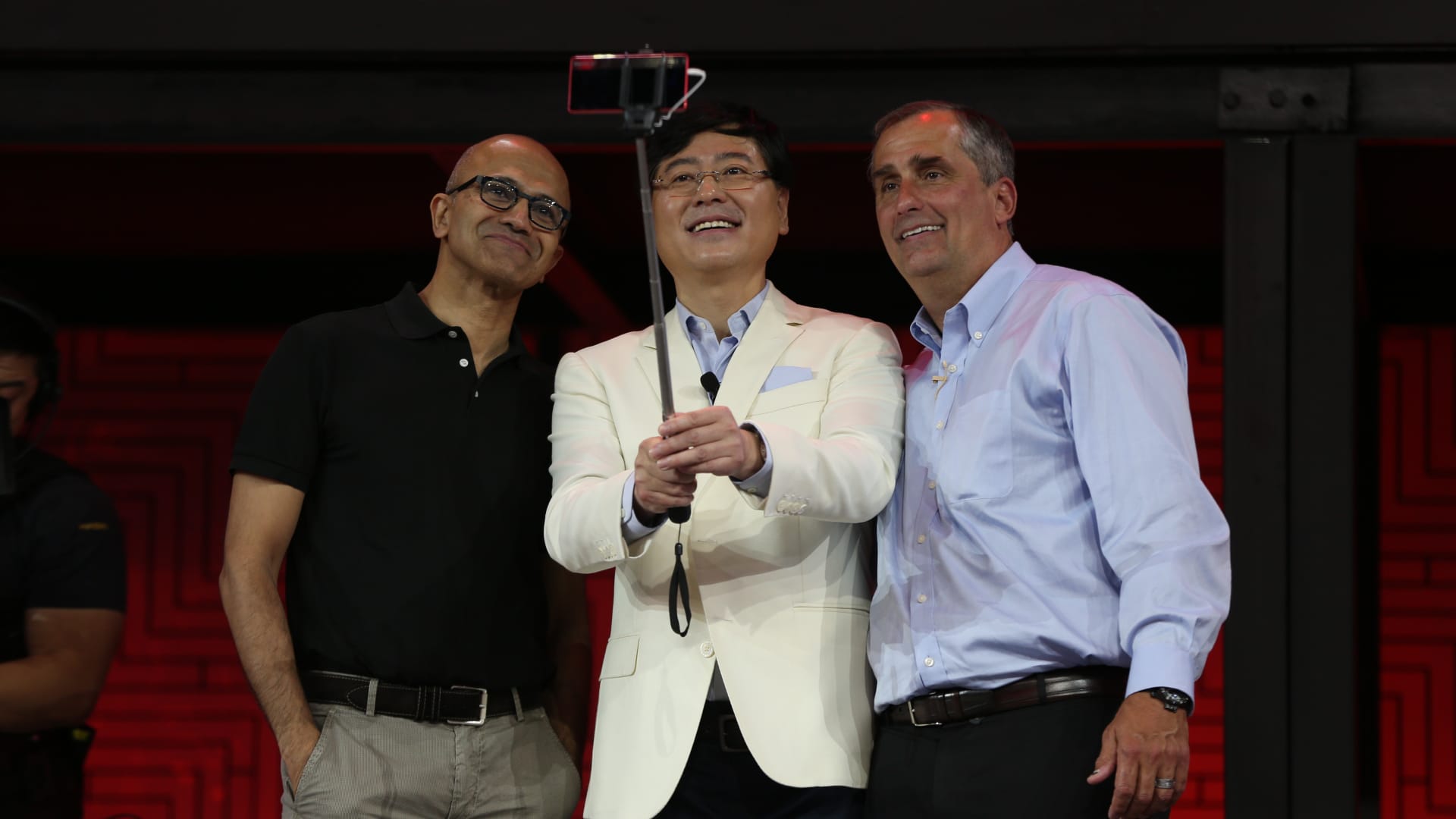 Lenovo Chairman and CEO Yang Yuanqing, center, takes a selfie with Microsoft CEO Satya Nadella, left, and then-Intel CEO Brian Krzanich during the Lenovo Tech World event at China National Convention Center on May 28, 2015 in Beijing. Lenovo launched a series of new products during the one-day event.