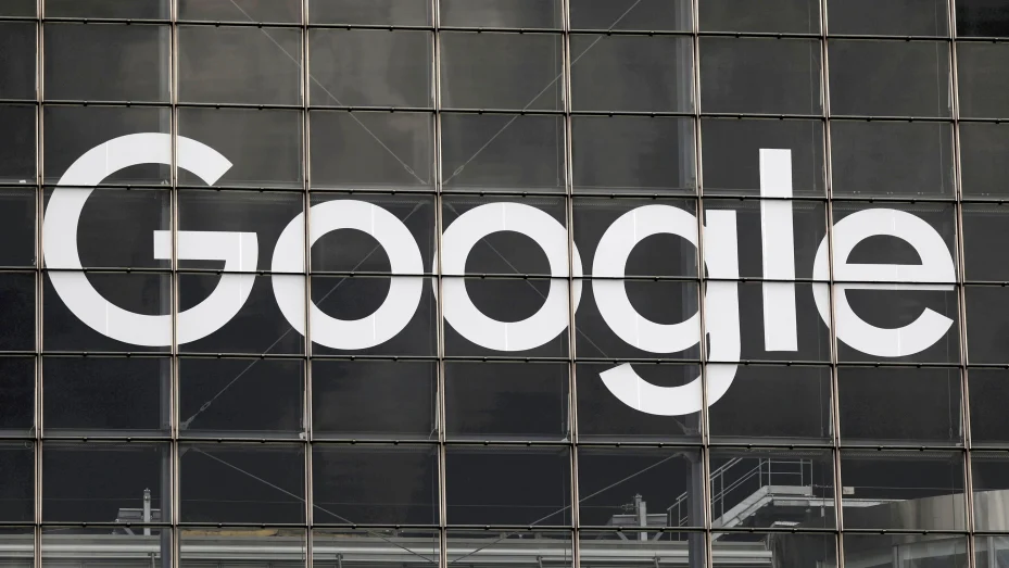 The logo of Google is seen on a building at La Defense business and financial district in Courbevoie near Paris, France, September 1, 2020.