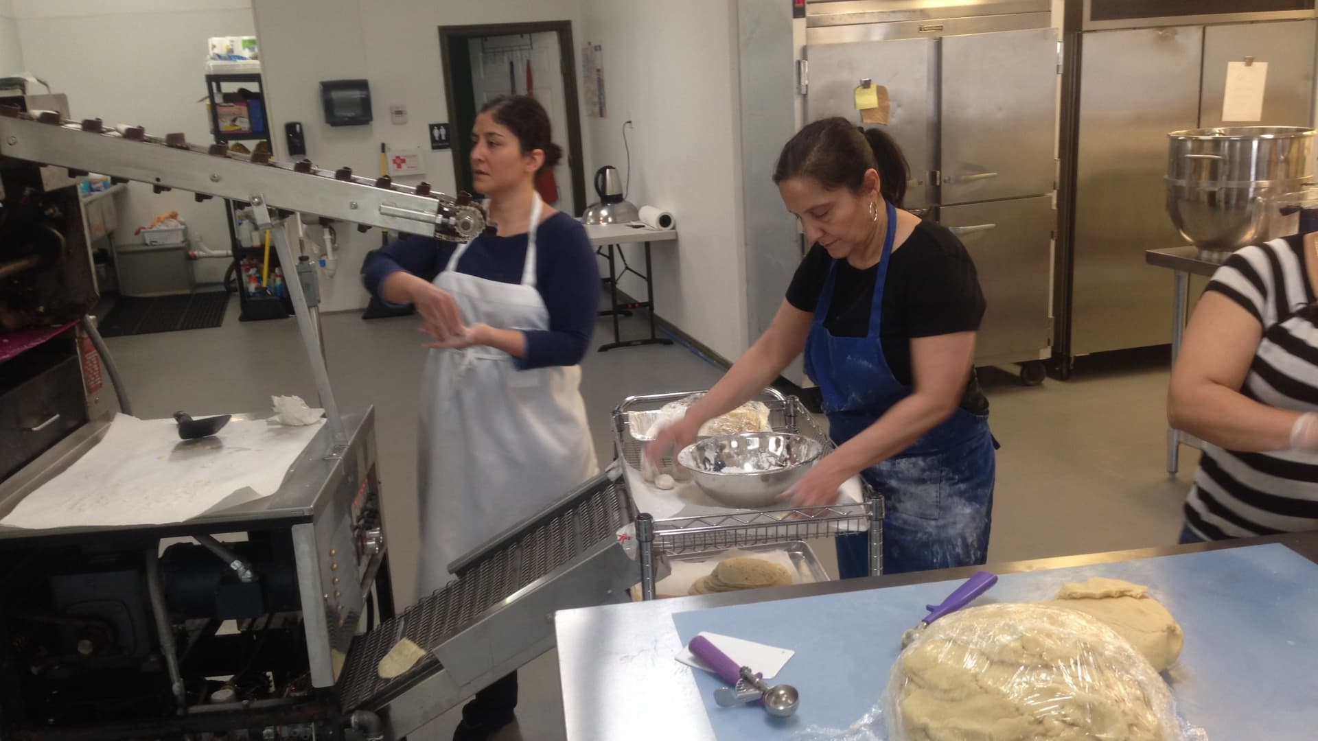 Veronica Garza and her mother, Aida, making tortillas in the Austin commercial kitchen in Siete's early days.