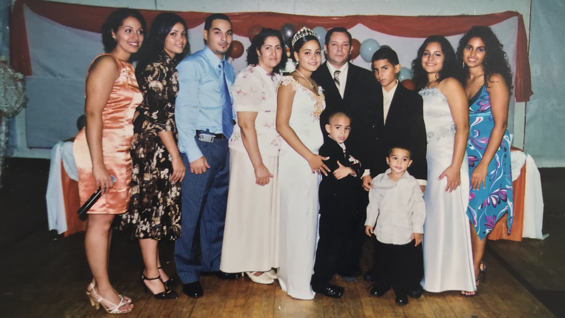Yanely Espinal, pictured with her family, at her 16th birthday party.