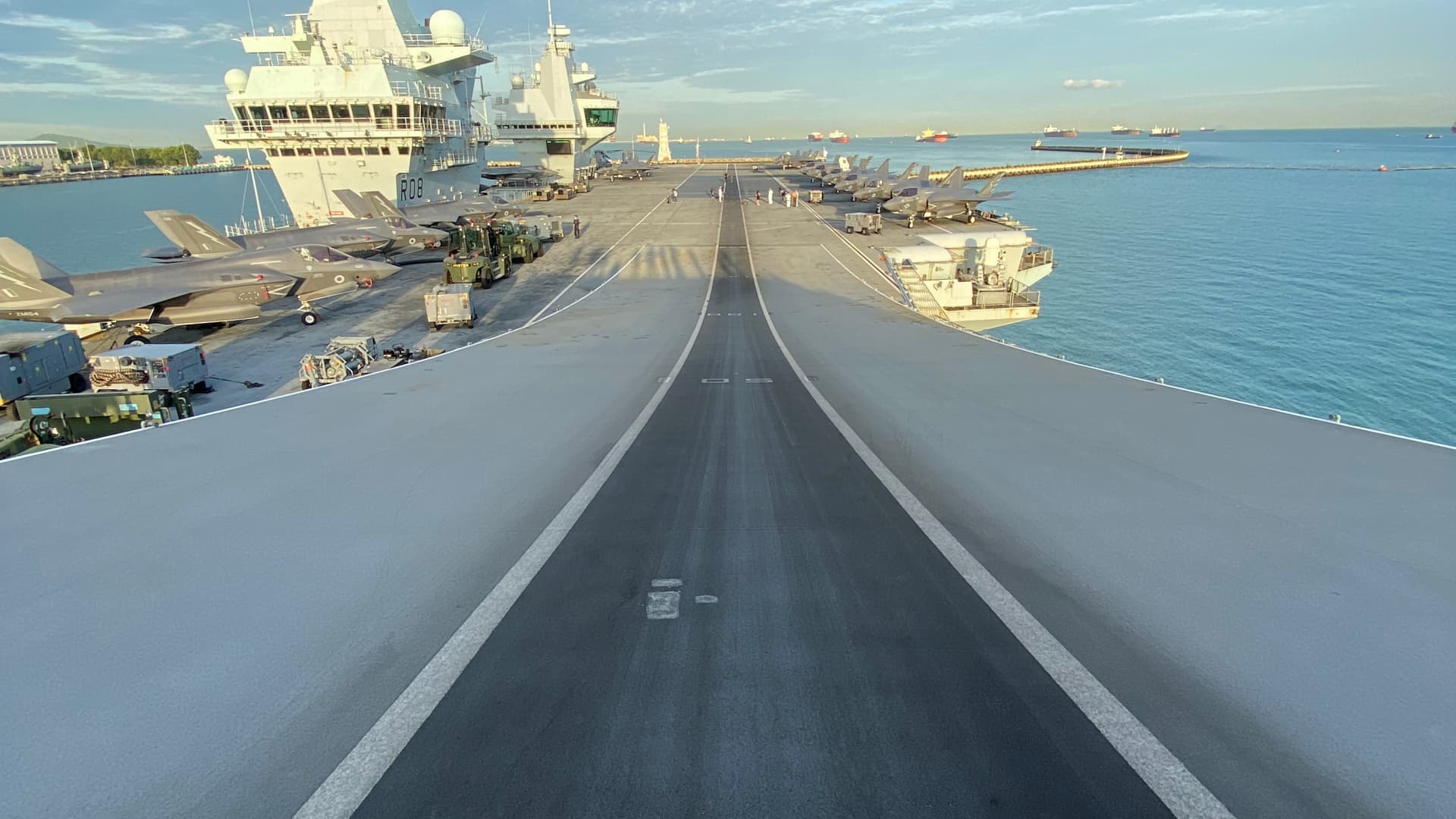 A view of HMS Queen Elizabeth's flight deck from the top of the aircraft carrier's ski ramp.