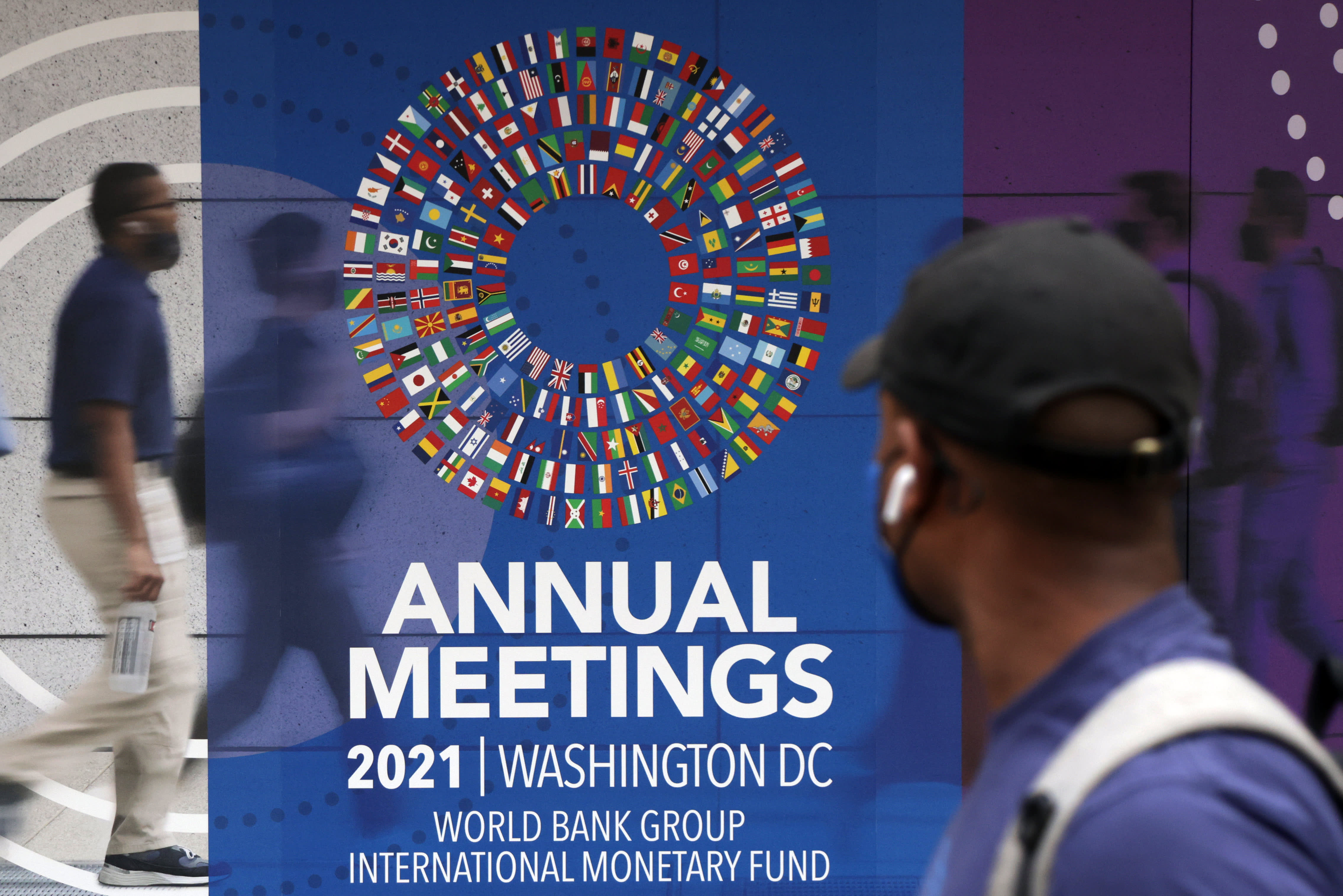IMF cuts its global growth forecast, citing supply disruptions and the pandemic