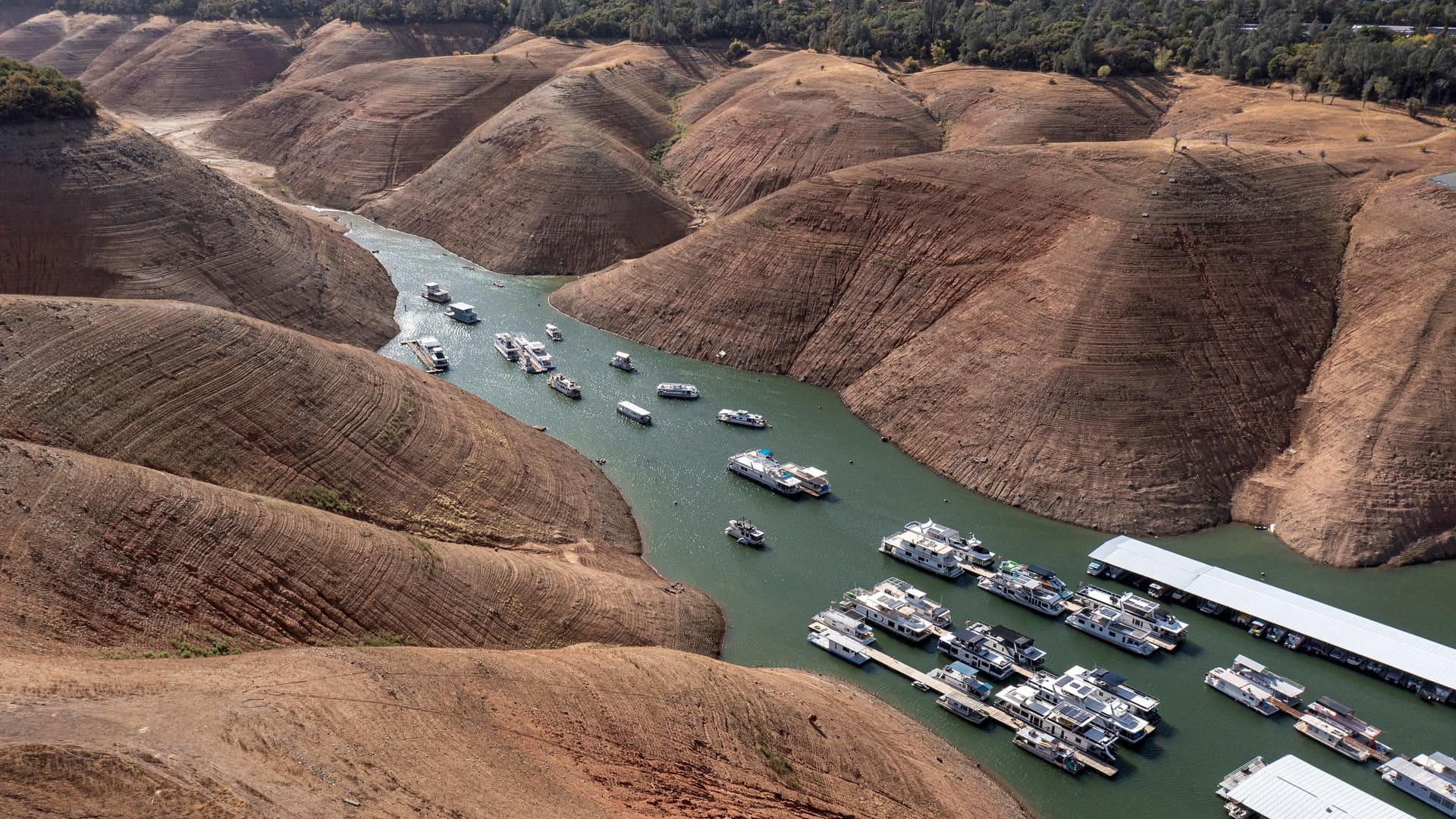 Houseboats on Lake Oroville during a drought in Oroville, California, U.S., on Monday, Oct. 11, 2021.