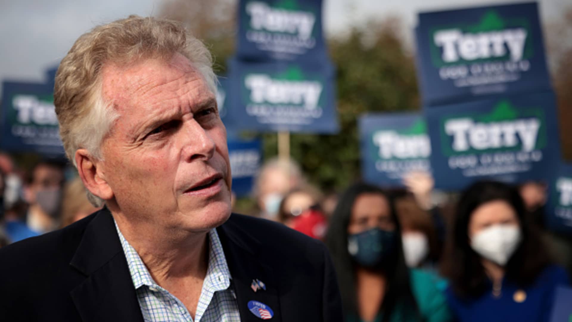 Former Virginia Gov. Terry McAuliffe, Democratic gubernatorial candidate for Virginia for a second term, answers questions from reporters after casting his ballot during early voting at the Fairfax County Government Center October 13, 2021 in Fairfax, Virginia.