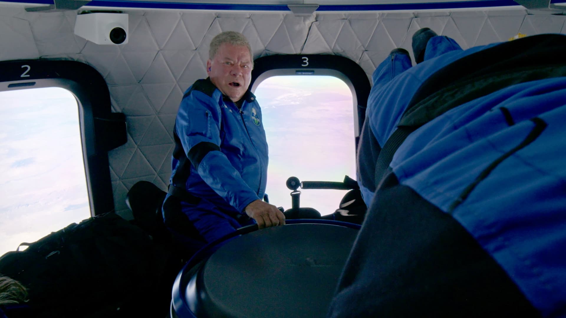 Star Trek actor William Shatner experiences weightlessness with three other passengers during the apogee of the Blue Origin New Shepard mission NS-18 suborbital flight near Van Horn, Texas, U.S. in a still image from video October 13, 2021.