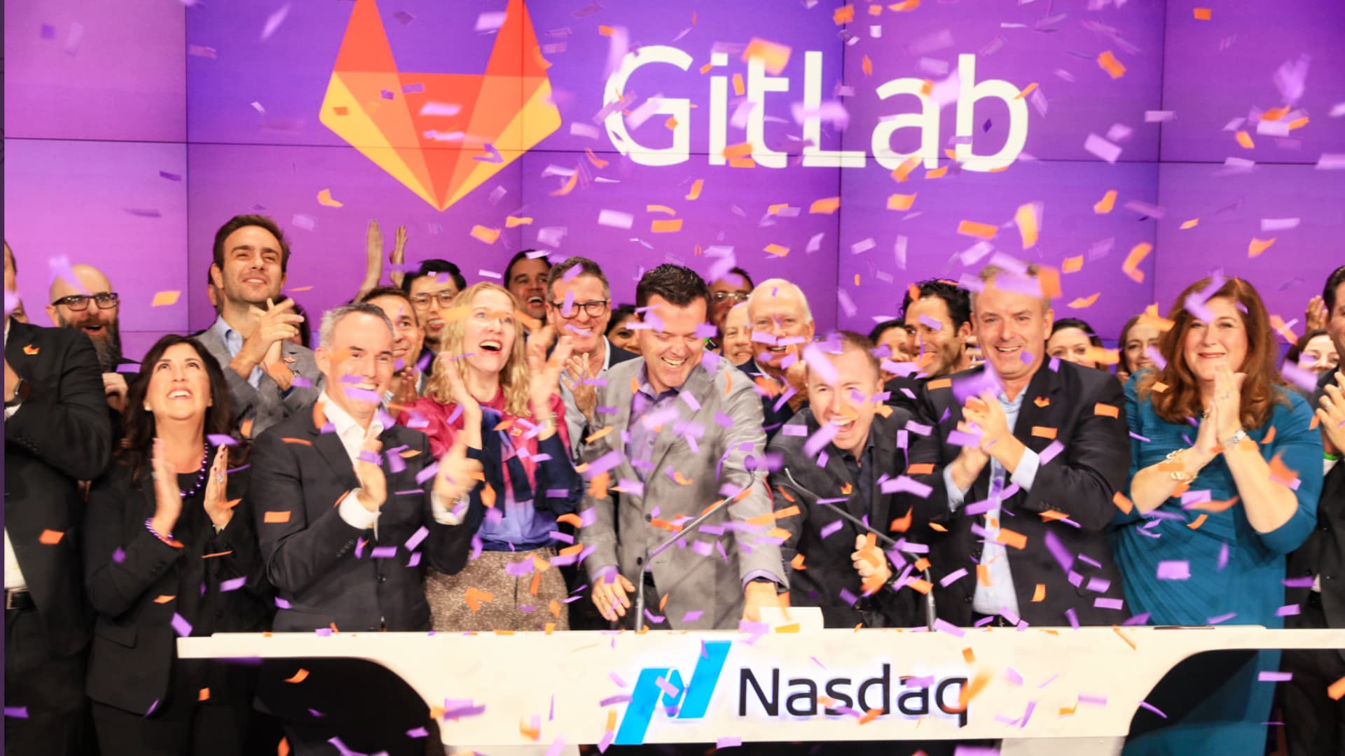 People celebrate the Gitlab IPO at the Nasdaq, October 14, 2021.