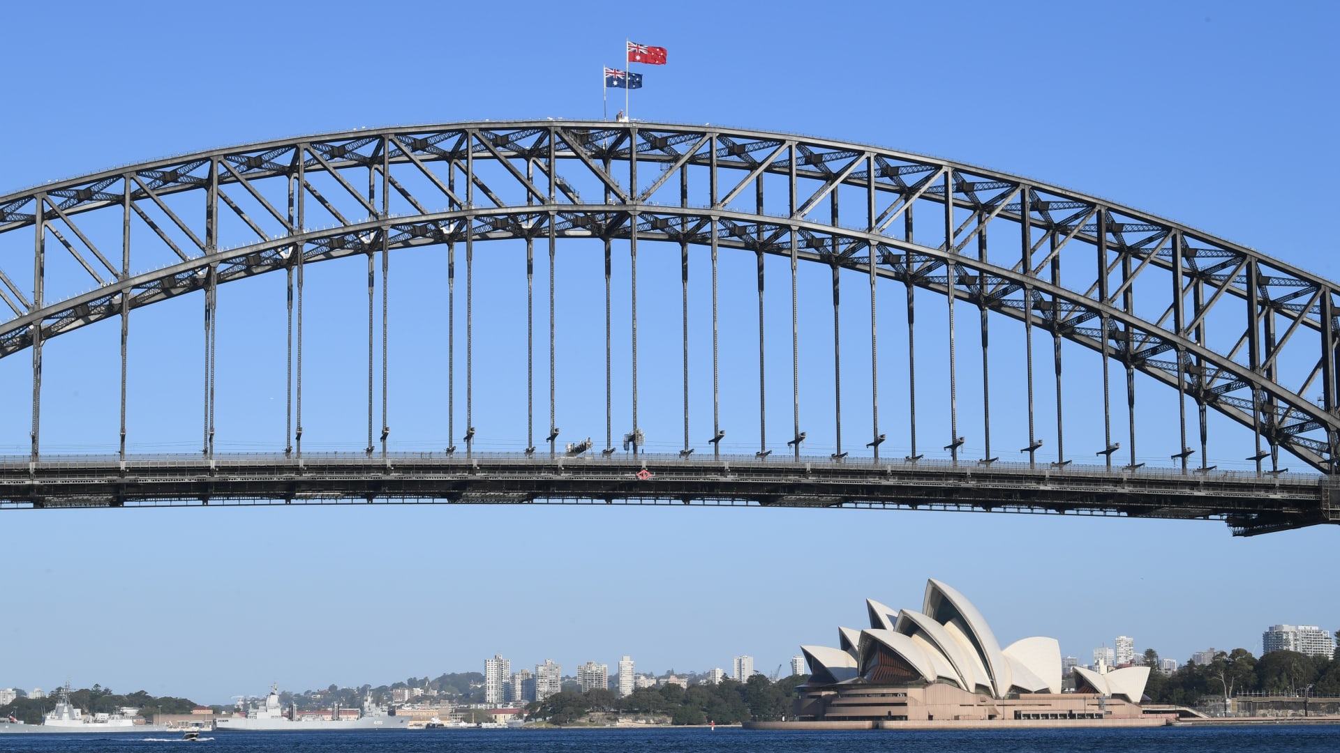 A red ensign flies atop the Sydney Harbour Bridge to commemorate Merchant Navy Day on September 03, 2021 in Sydney, Australia.