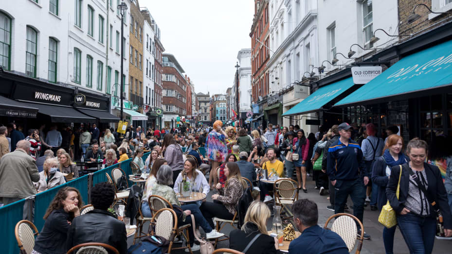 People seen dining outdoors in Soho in London in September 2021. Since Covid restrictions were lifted in the U.K., people have flocked back to streets, shops and public spaces.